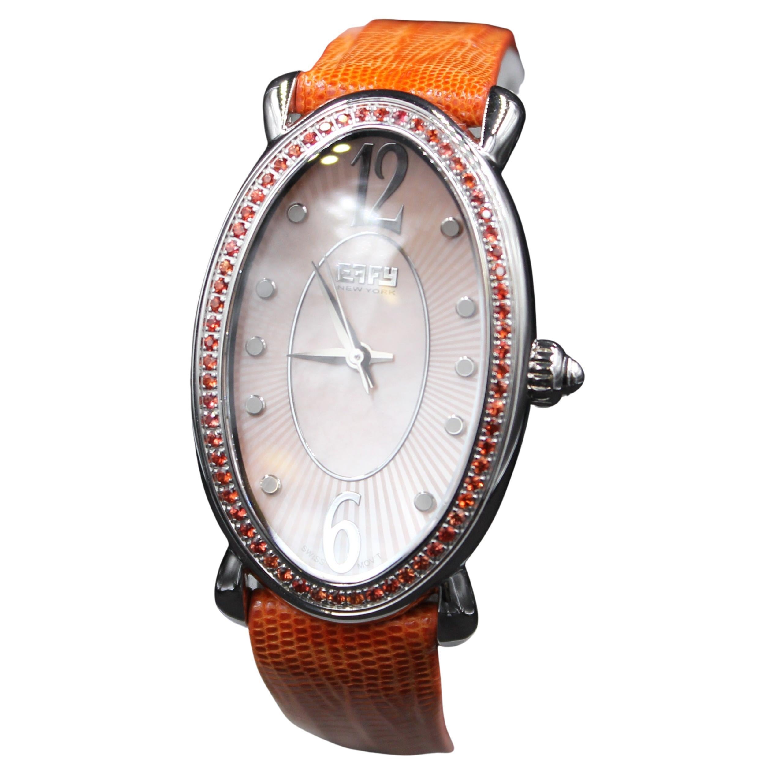 Reloj de lujo de cuarzo suizo con correa de piel exótica, zafiro naranja, diamantes y esfera pavé