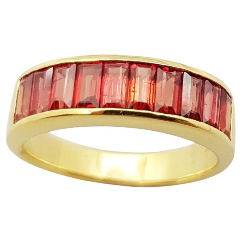 Orange Sapphire Ring Set in 18 Karat Gold Settings For Sale
