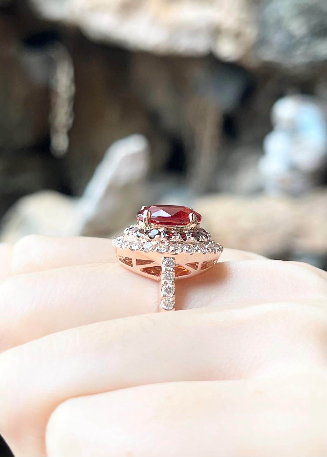 Orange Sapphire 5.09 carats, Treated Orange Diamond 0.61 carat and Brown Diamond 1.05 carats Ring set in 18K Rose Gold Settings

Width:  1.6 cm 
Length: 1.8 cm
Ring Size: 54
Total Weight: 7.73 grams
AIGS GF18012442


