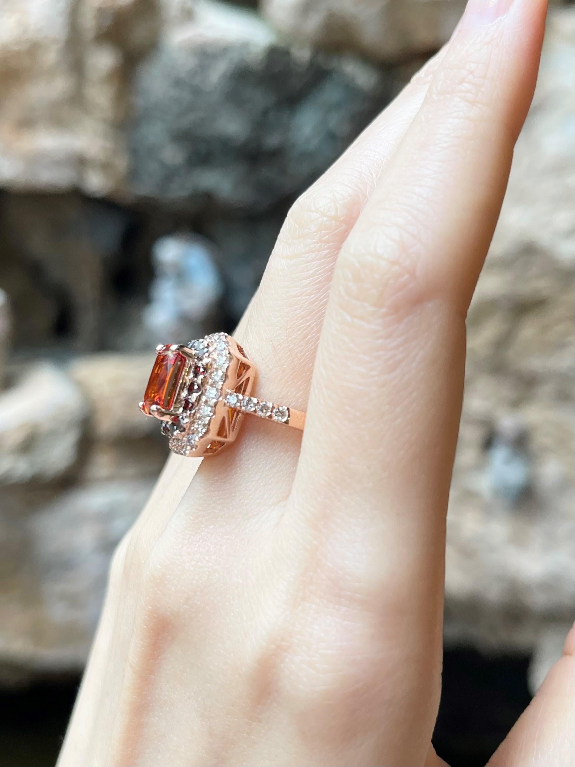 Orange Sapphire 4.08 carats, Treated Orange Diamond 0.63 carat and Brown Diamond 0.97 carat Ring set in 18K Rose Gold Settings

Width:  1.5 cm 
Length: 1.6 cm
Ring Size: 54
Total Weight: 7.65 grams
GIT G2311220140001


