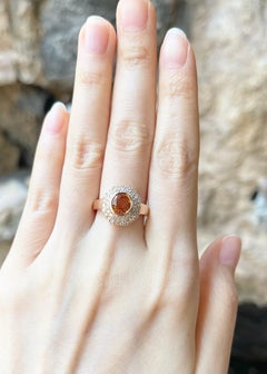 Orange Sapphire with Brown Diamond Ring set in 18K Rose Gold Settings