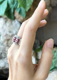 Orange Sapphire with Cubic Zirconia Ring set in Silver Settings