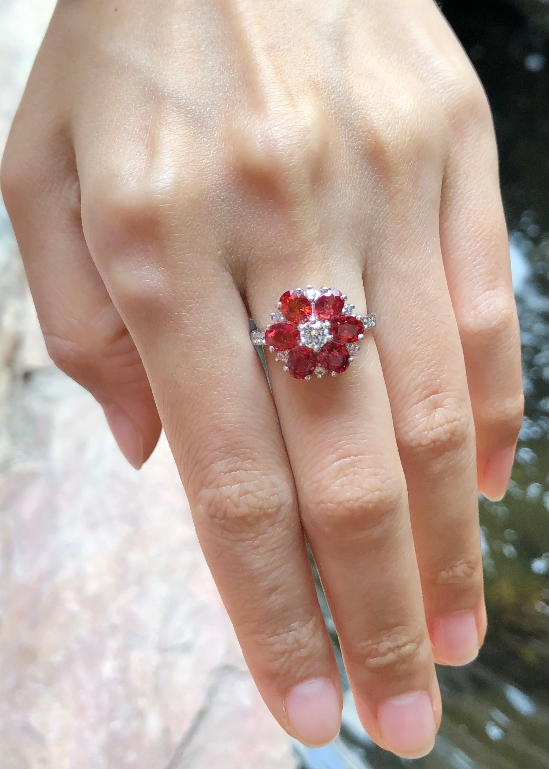 Contemporary Orange Sapphire with Cubic Zirconia Ring set in Silver Settings For Sale