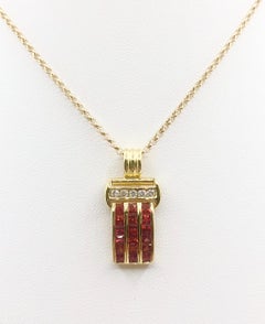 Orange Sapphire with Diamond Pendant Set in 18 Karat Gold Settings