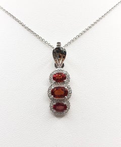 Orange Sapphire with Diamond Pendant Set in 18 Karat White Gold Settings