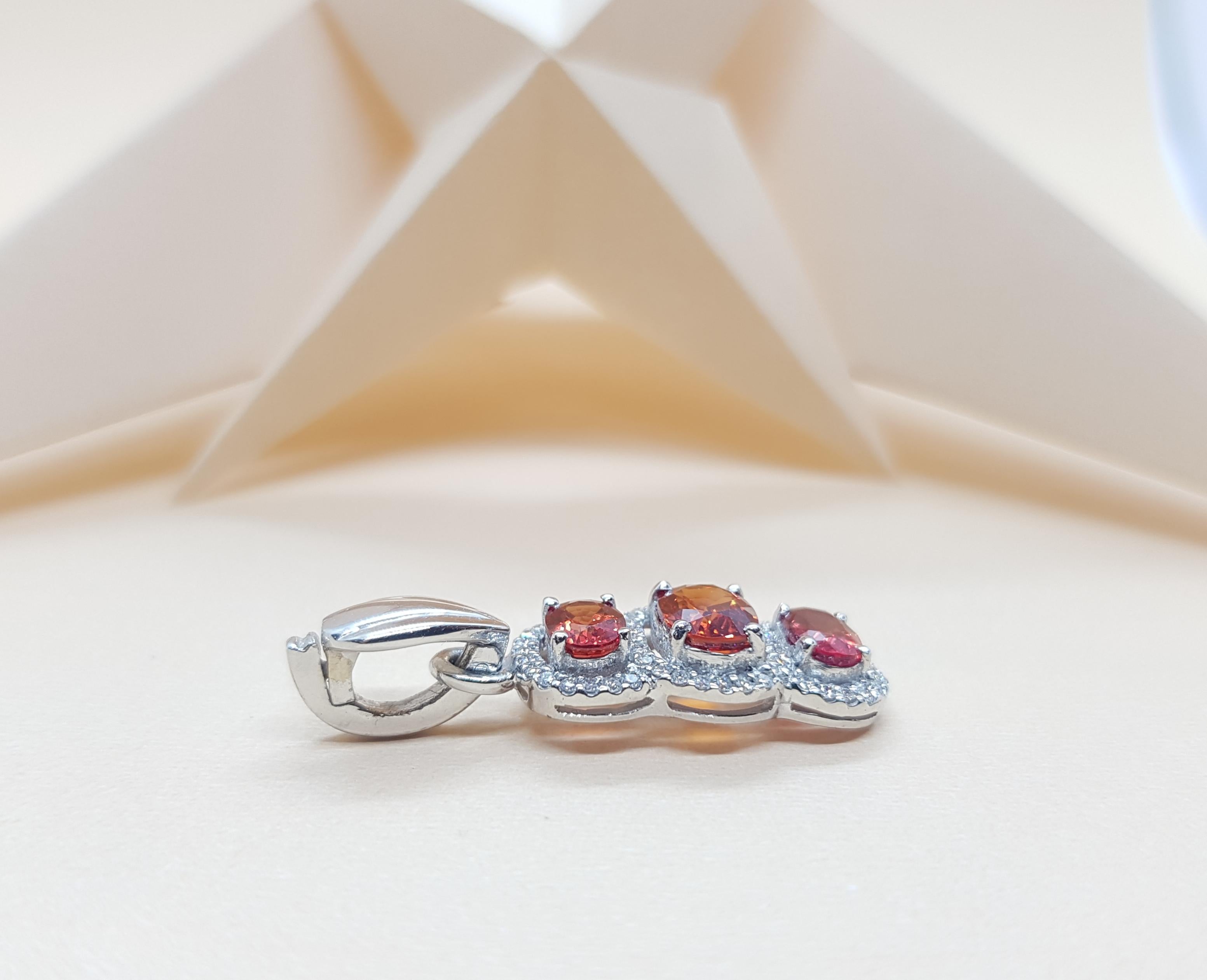 Oval Cut Orange Sapphire with Diamond Pendant Set in 18 Karat White Gold Settings For Sale
