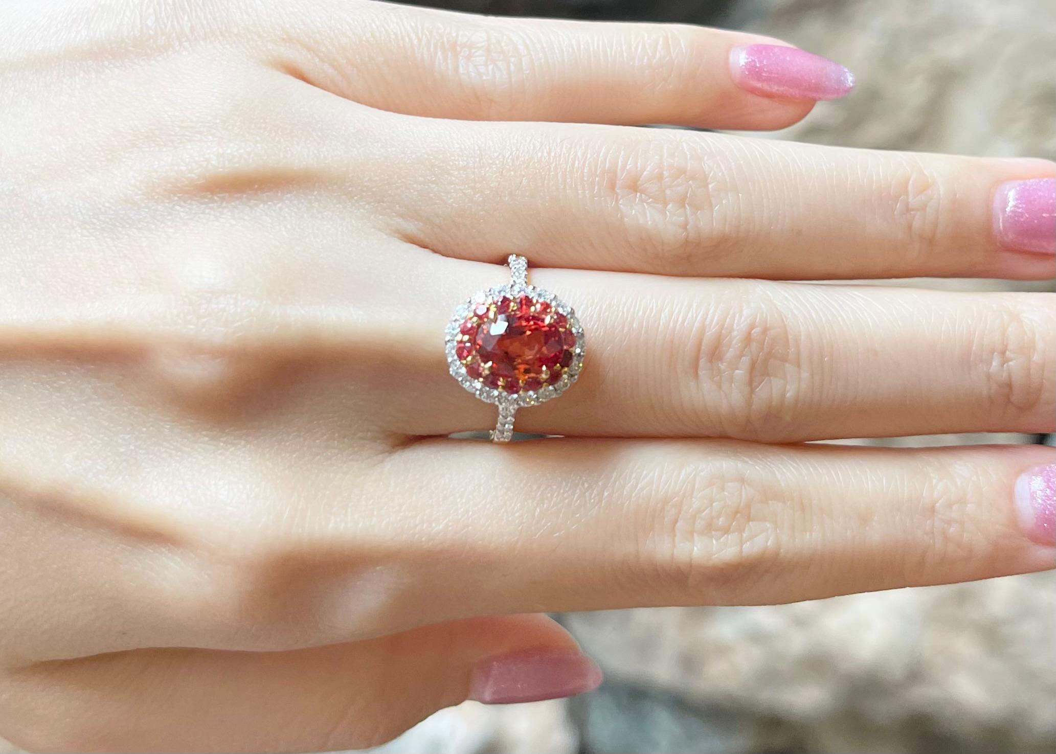 Contemporary Orange Sapphire with Diamond Ring set in 18K Gold Settings For Sale