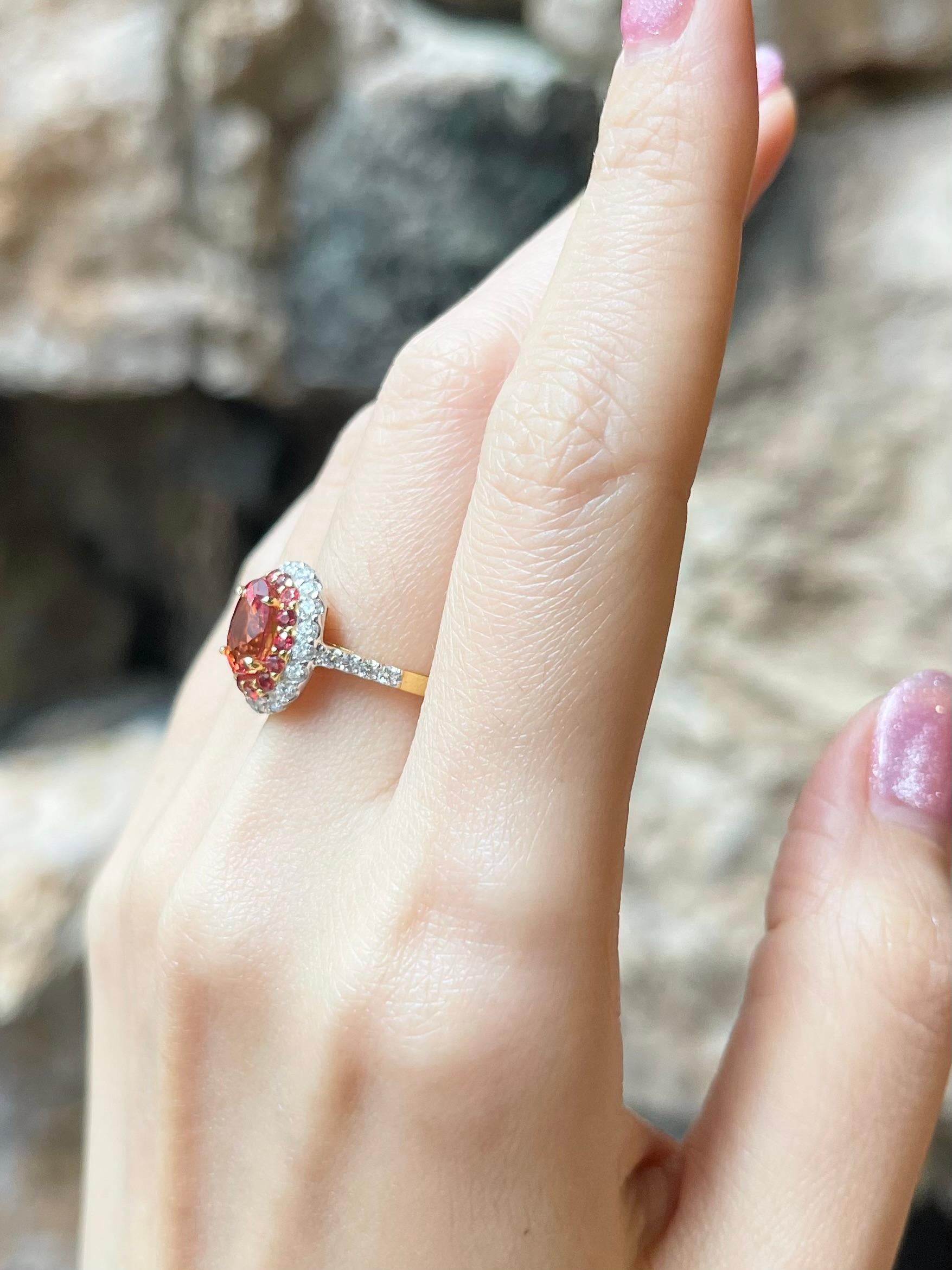Oval Cut Orange Sapphire with Diamond Ring set in 18K Gold Settings For Sale