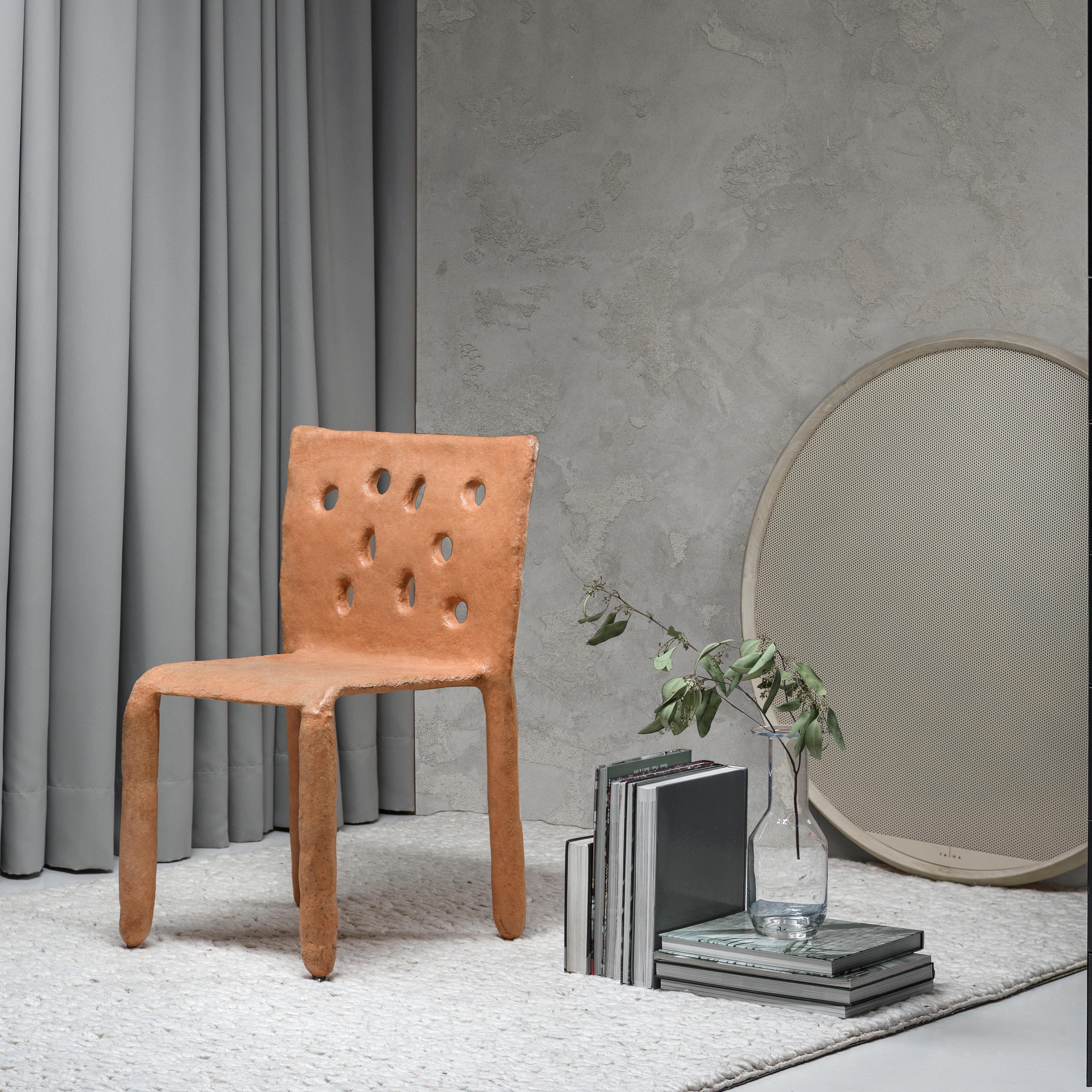 Sculpted Outdoor contemporary chair by FAINA
Design: Victoriya Yakusha
Material: steel, flax rubber, biopolymer, cellulose
Dimensions: Height 82 x width 54 x legs depth 45 cm
Weight: 15 kilos.

Indoor finish available, please contact