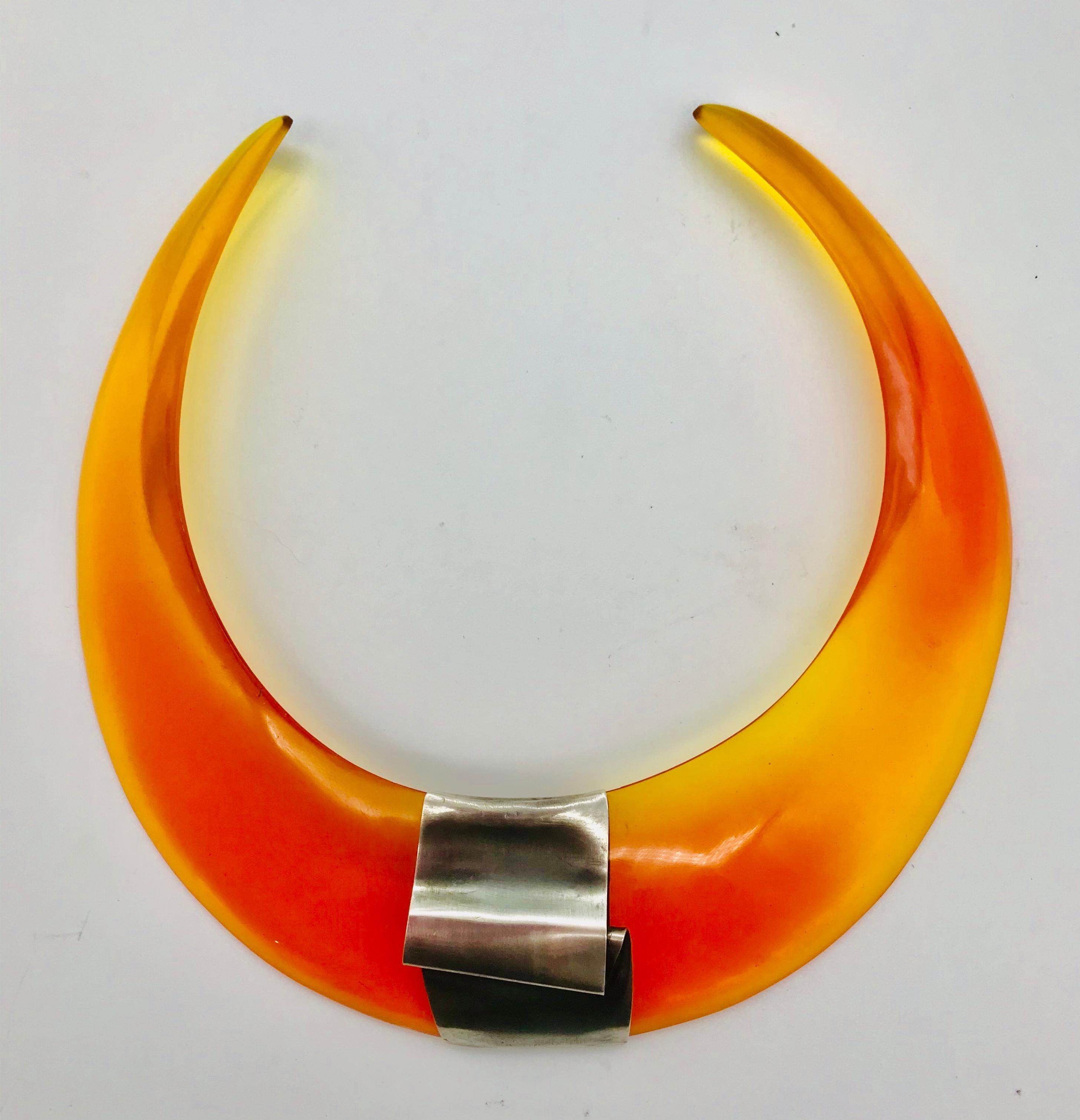 The orange see through Lucite Choker was designed and made in Bali in collaboration with my daughter Gaella.  During my trip in search for beautiful shells and Pearls on sustainable pearl farm in North Bali, Indonesia. We also experimented with this