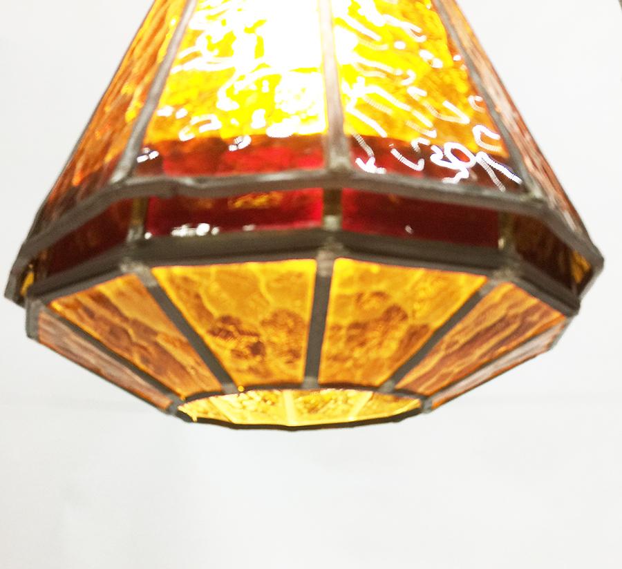 Orange Stained Glass Ceiling Lamp, 1930s

Orange and red stained glass ceiling lamp, 1930s
Antique glass
The metal large size chain is approx. 1 meter long
The height is 40 cm and 30 cm diagonal.