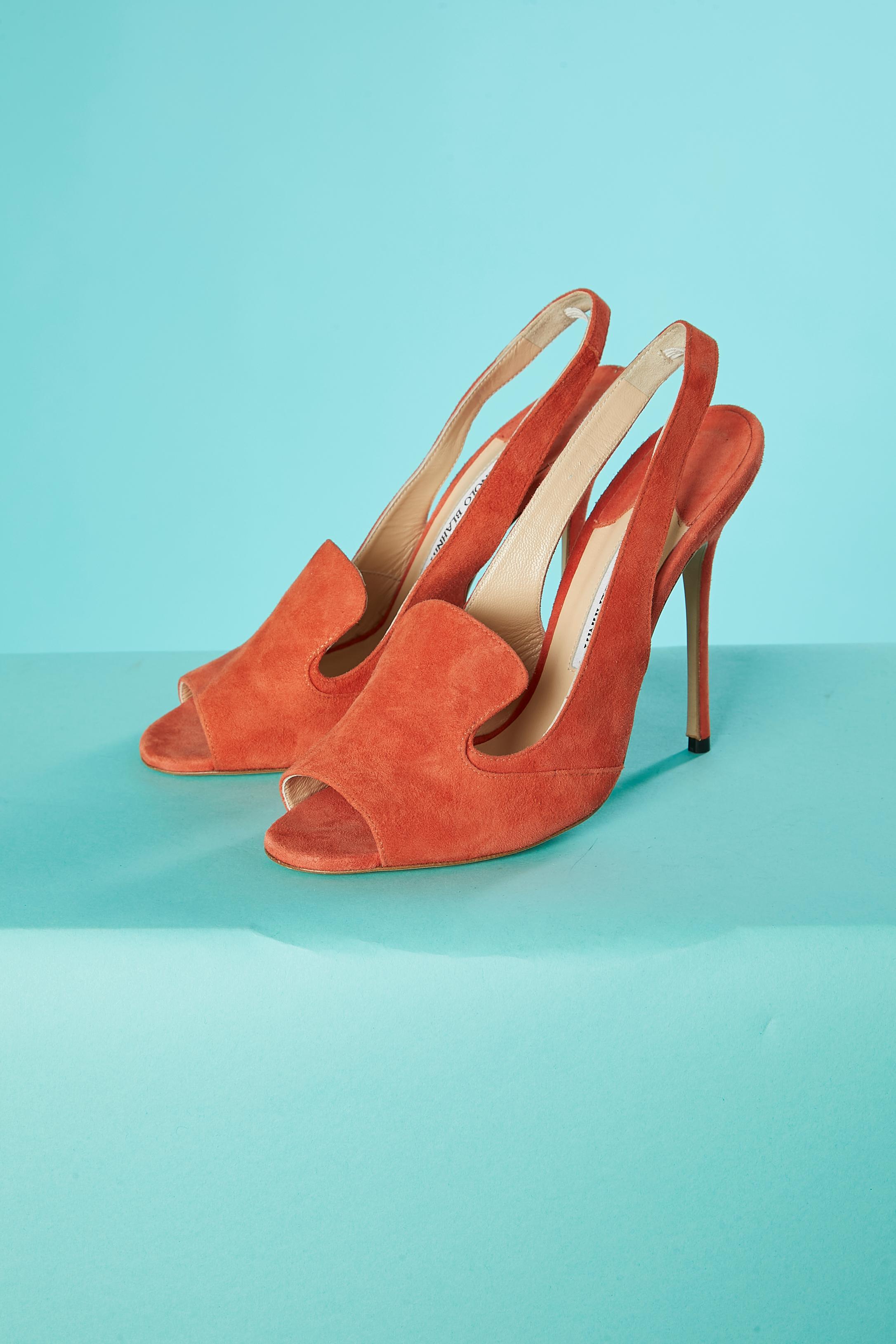 Orange suede high heels sandals. Leather insole and outsole. 
Heel's height : 12cm
 Shoe size : 38 1/2