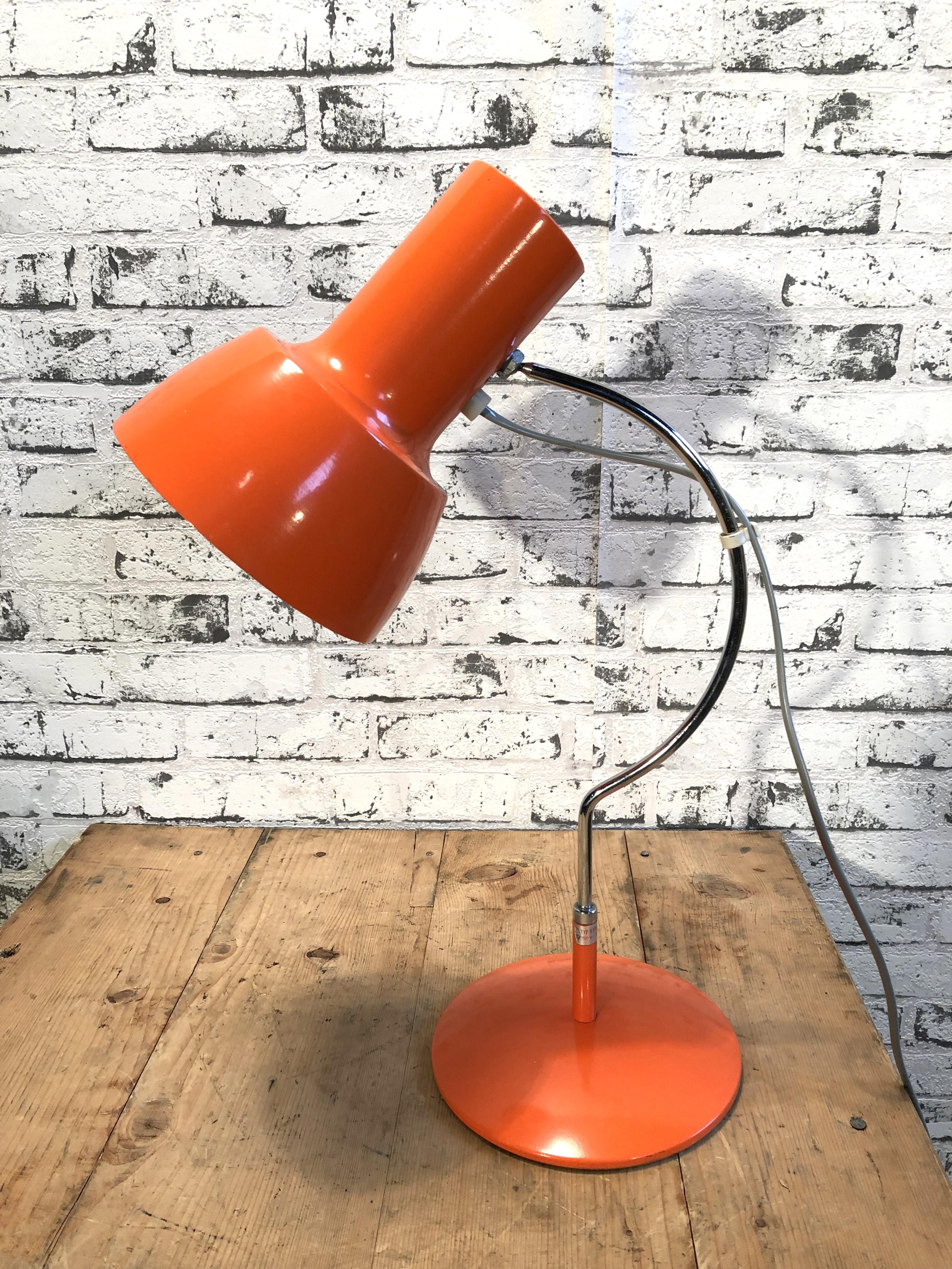 This table lamp, Napako model 1633, was designed by Josef Hurka and produced in former Czechoslovakia by Napako during the 1960s. The lamp has a steel body and an aluminium lampshade. Switch is situated directly on shade. Good vintage condition.