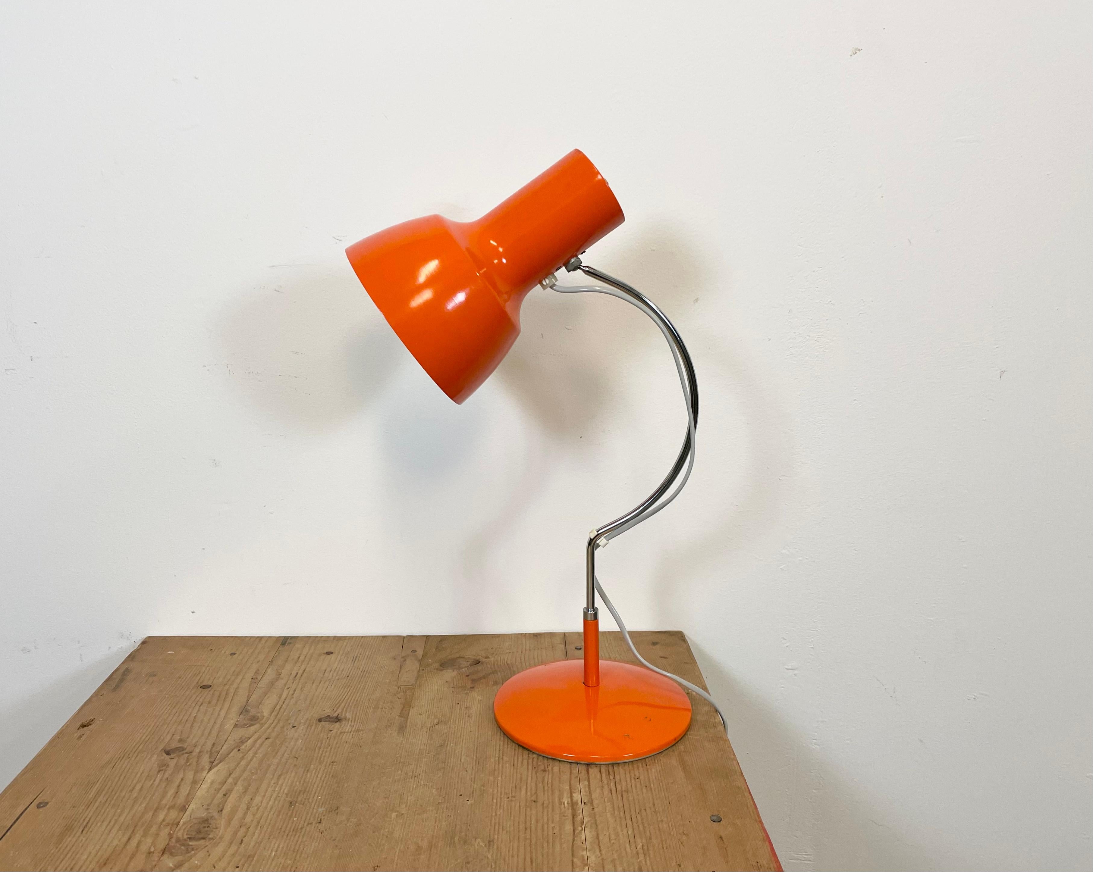 This table lamp, Napako model 1633, was designed by Josef Hurka and produced by Napako in former Czechoslovakia during the 1960s. The lamp has a steel body and an aluminium lampshade.Switch is situated directly on shade. Good vintage condition.