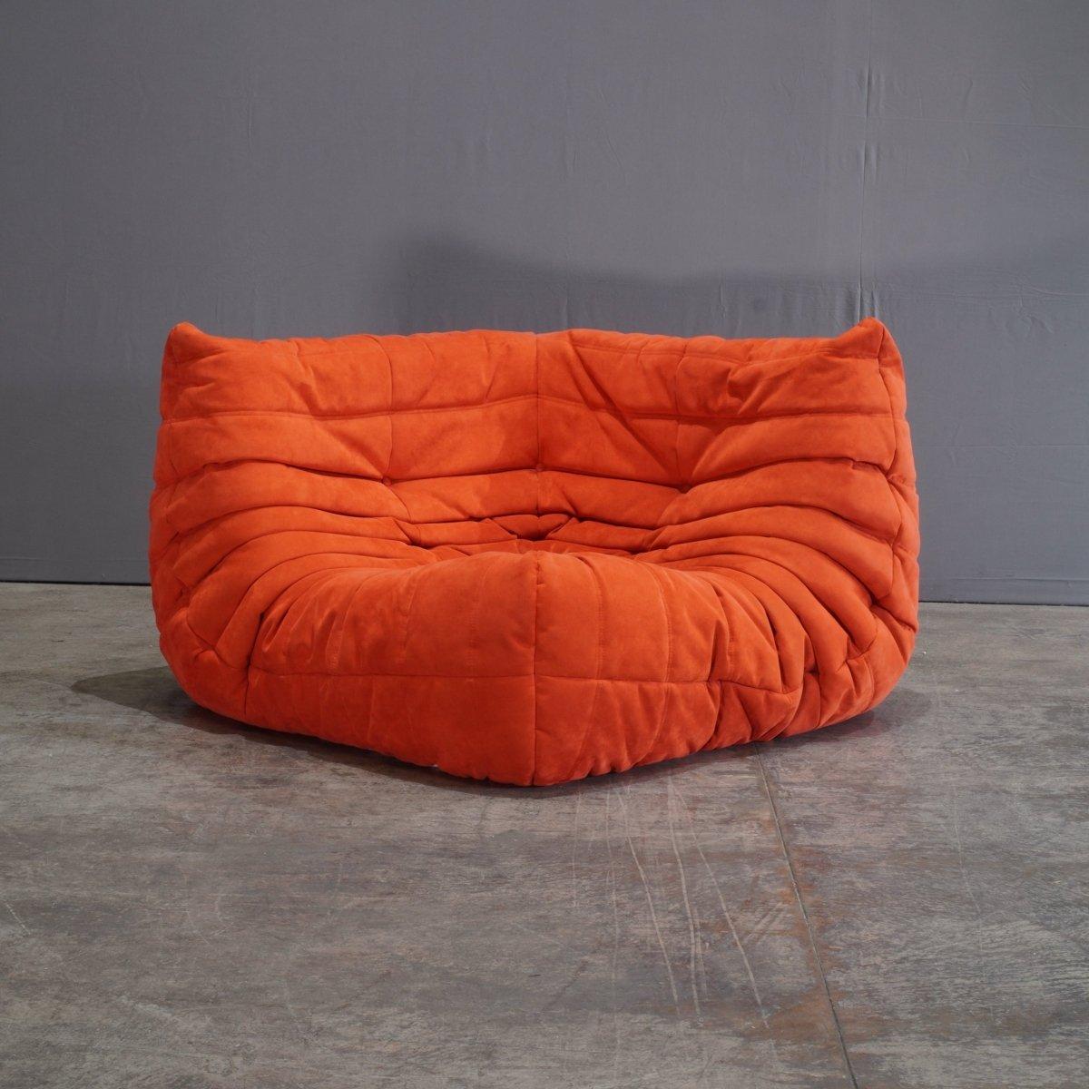 The iconic Togo sofa, originally designed by Michel Ducaroy for Ligne Roset in 1973, has become a mid-century design classic. This blood orange corner sofa is incredibly versatile and can be used alone or paired with other pieces from the range.