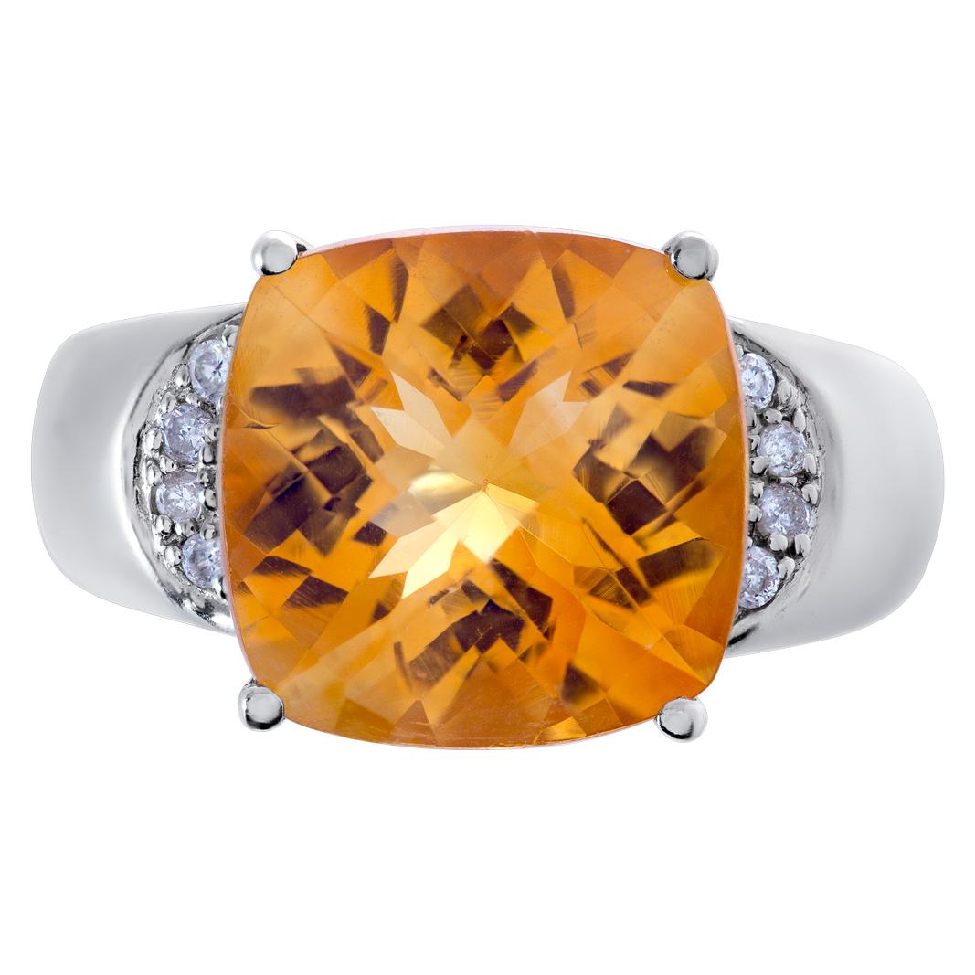 Vibrant orange topaz and diamond ring in 14k white gold. Size 7, shank measures 2mm, head measures 12mm.

This Topaz ring is currently size 7 and some items can be sized up or down, please ask! It weighs 2.9 pennyweights and is 14k White Gold.