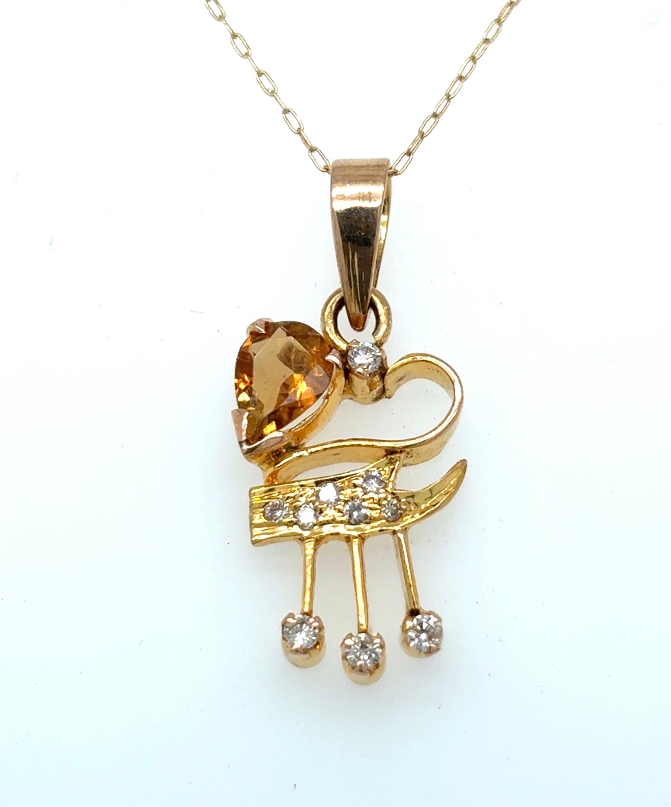 Art déco Collier à pendentif en or jaune avec tourmaline orange et diamant en vente