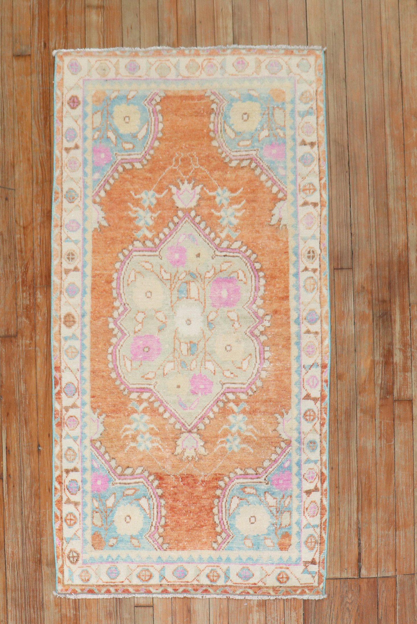 Mid-20th Century Turkiish anatolian rug featuring a bright orange color.

Measures: 2'10