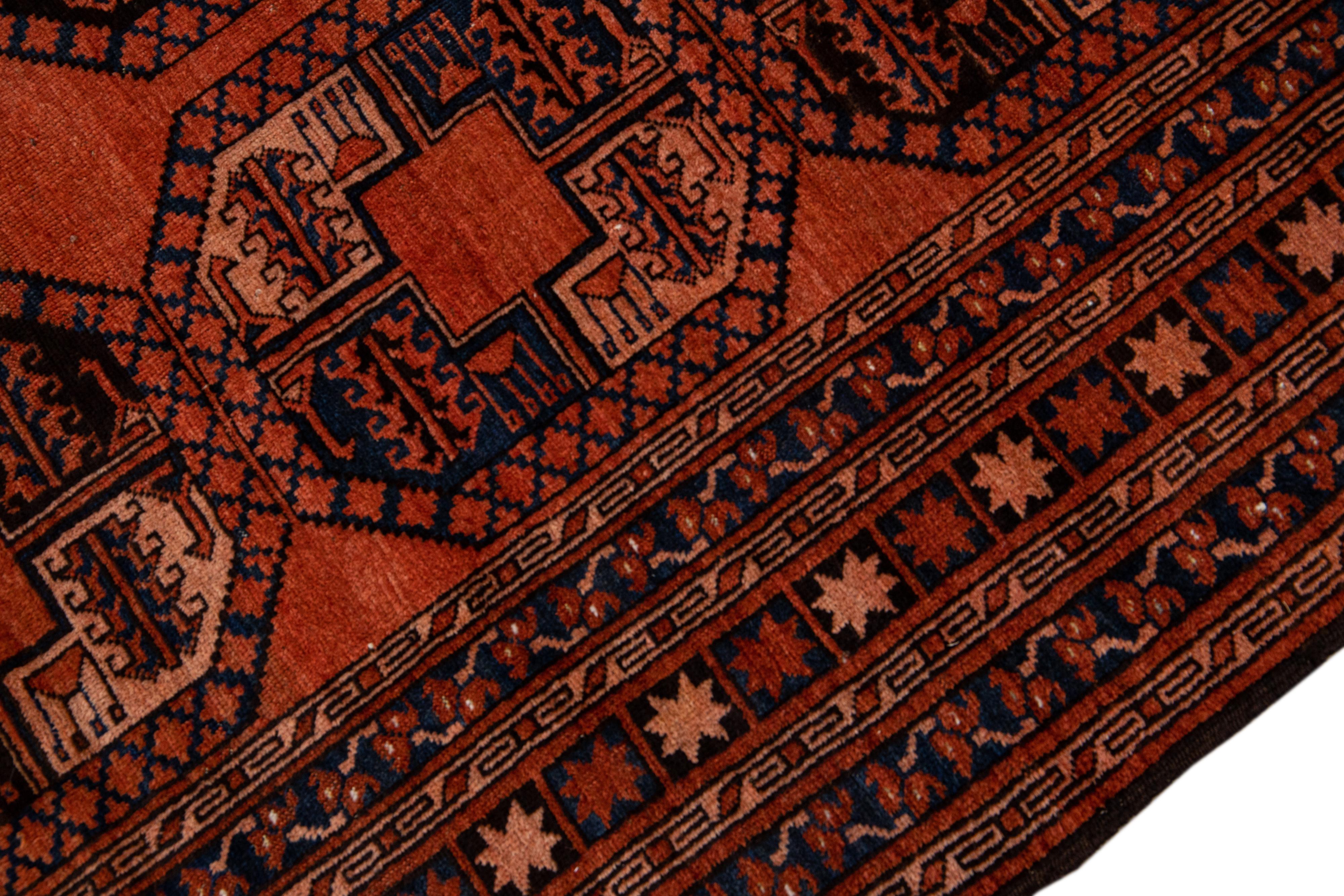 20th Century Orange Vintage Persian Turkmen Handmade Geometric Pattern Wool Rug For Sale
