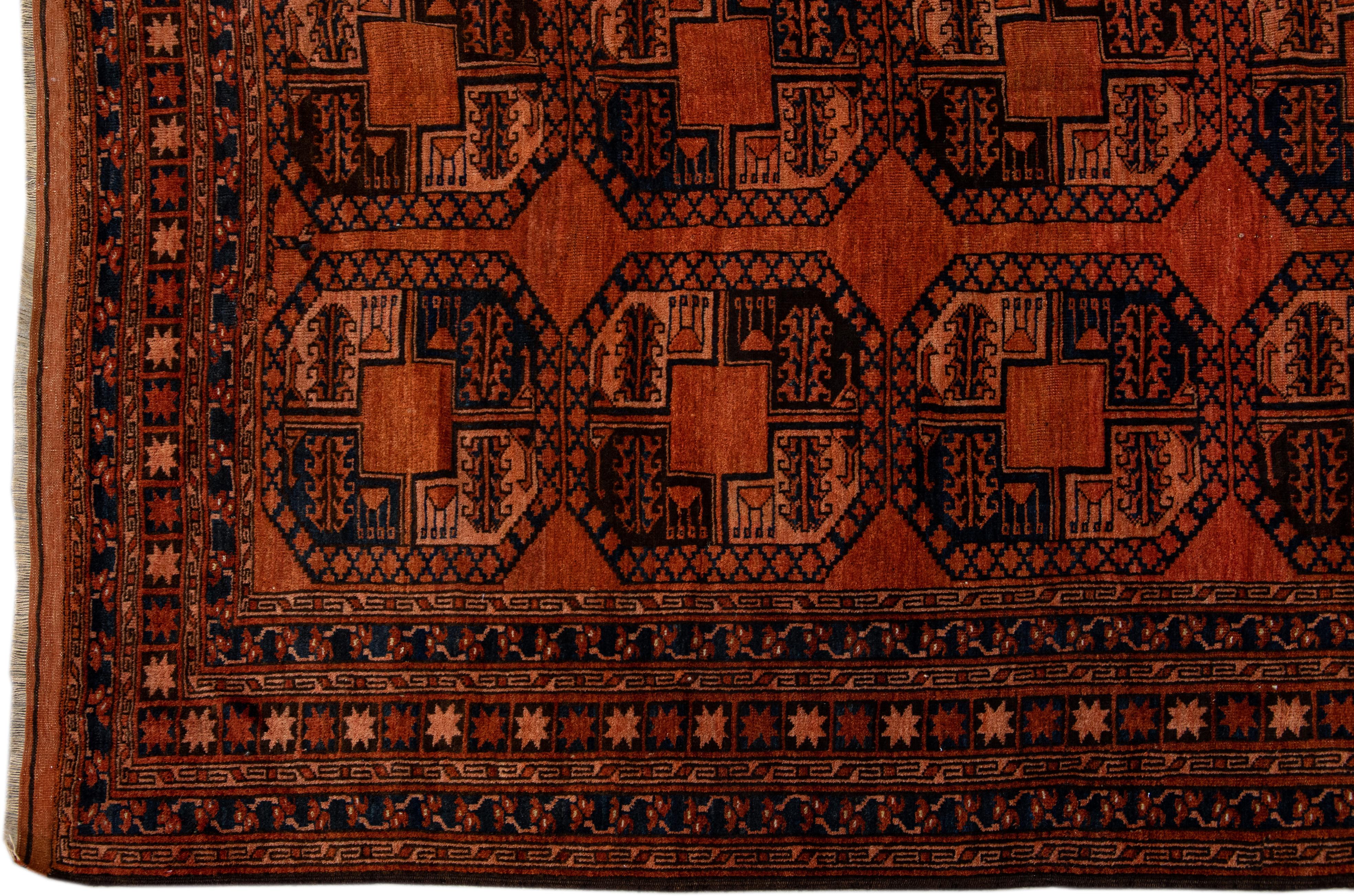 Orange Vintage Persian Turkmen Handmade Geometric Pattern Wool Rug For Sale 1