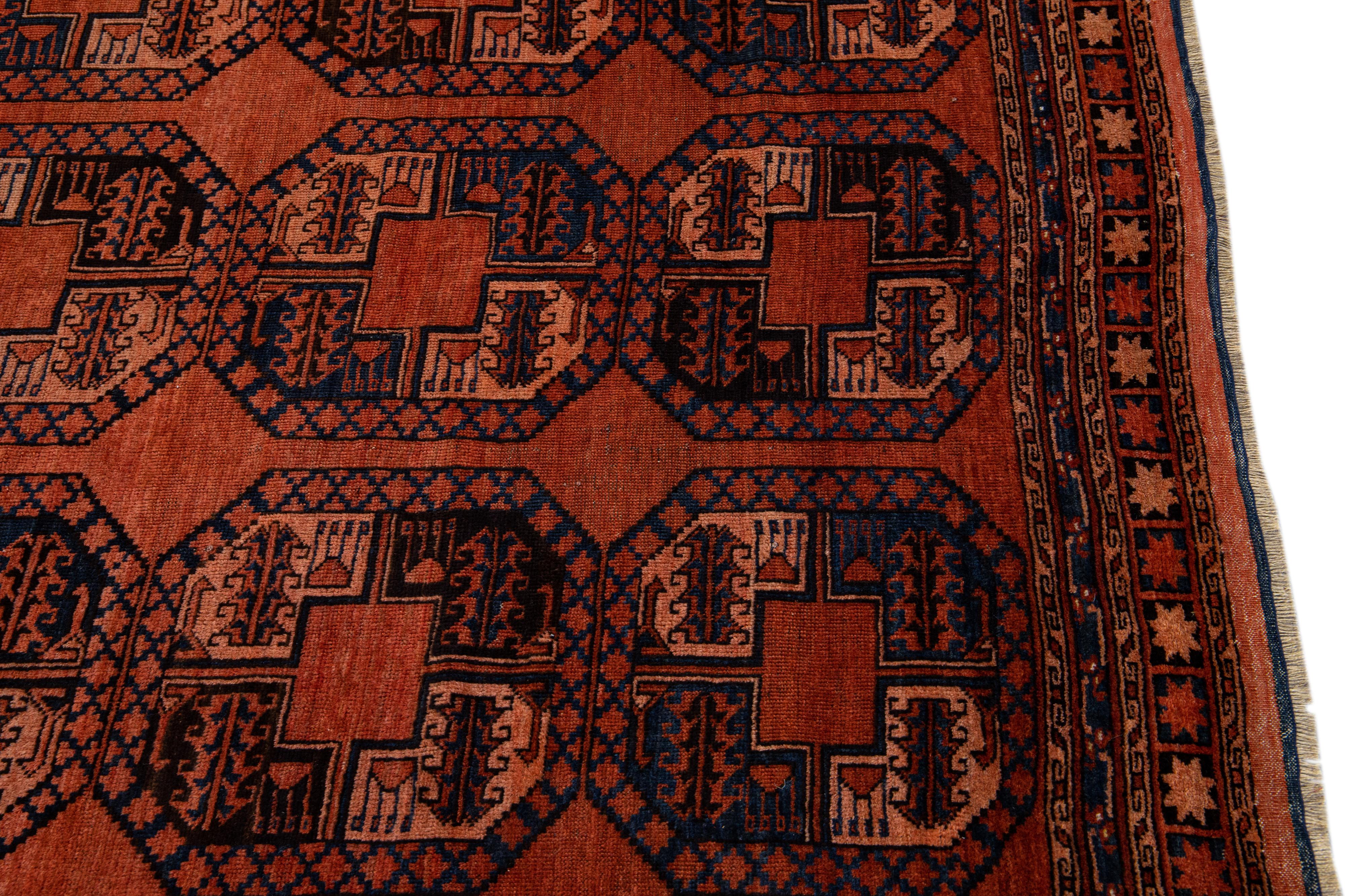 Orange Vintage Persian Turkmen Handmade Geometric Pattern Wool Rug For Sale 2