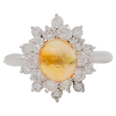 Orange Yellow Opal Oval and Diamond Cluster Ring in Platinum