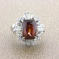Platinring mit orangefarbenem Zirkon und Diamant