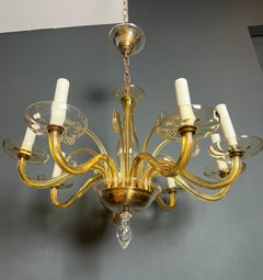 Lampadario in cristallo di Murano arancione con 8 bracci. Lavoro italiano. Circa 1970