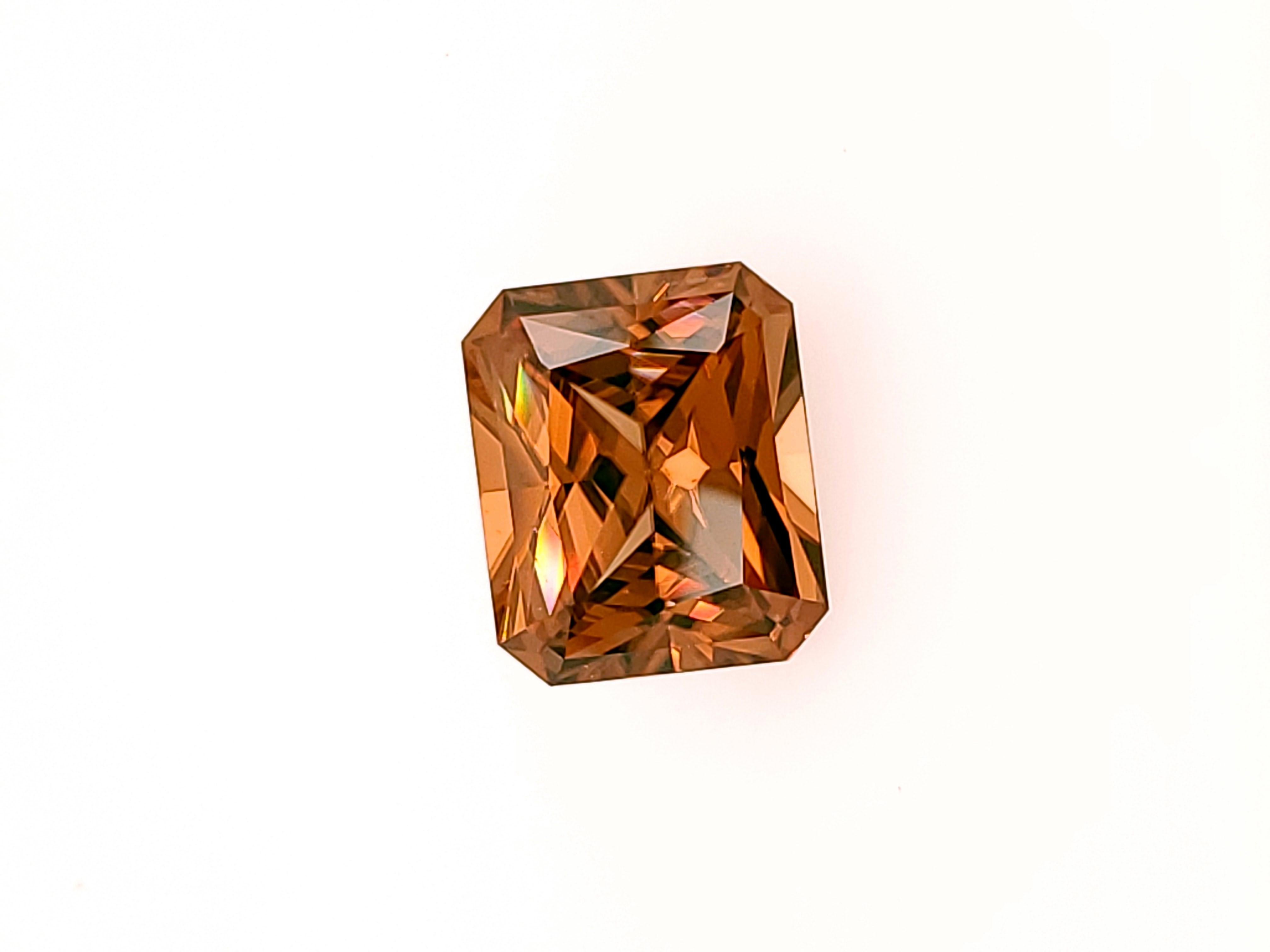 Orangy Zircon, Emerald Cut, weighing 8.71ct and Faceted in the U.S. In New Condition For Sale In Methuen, MA