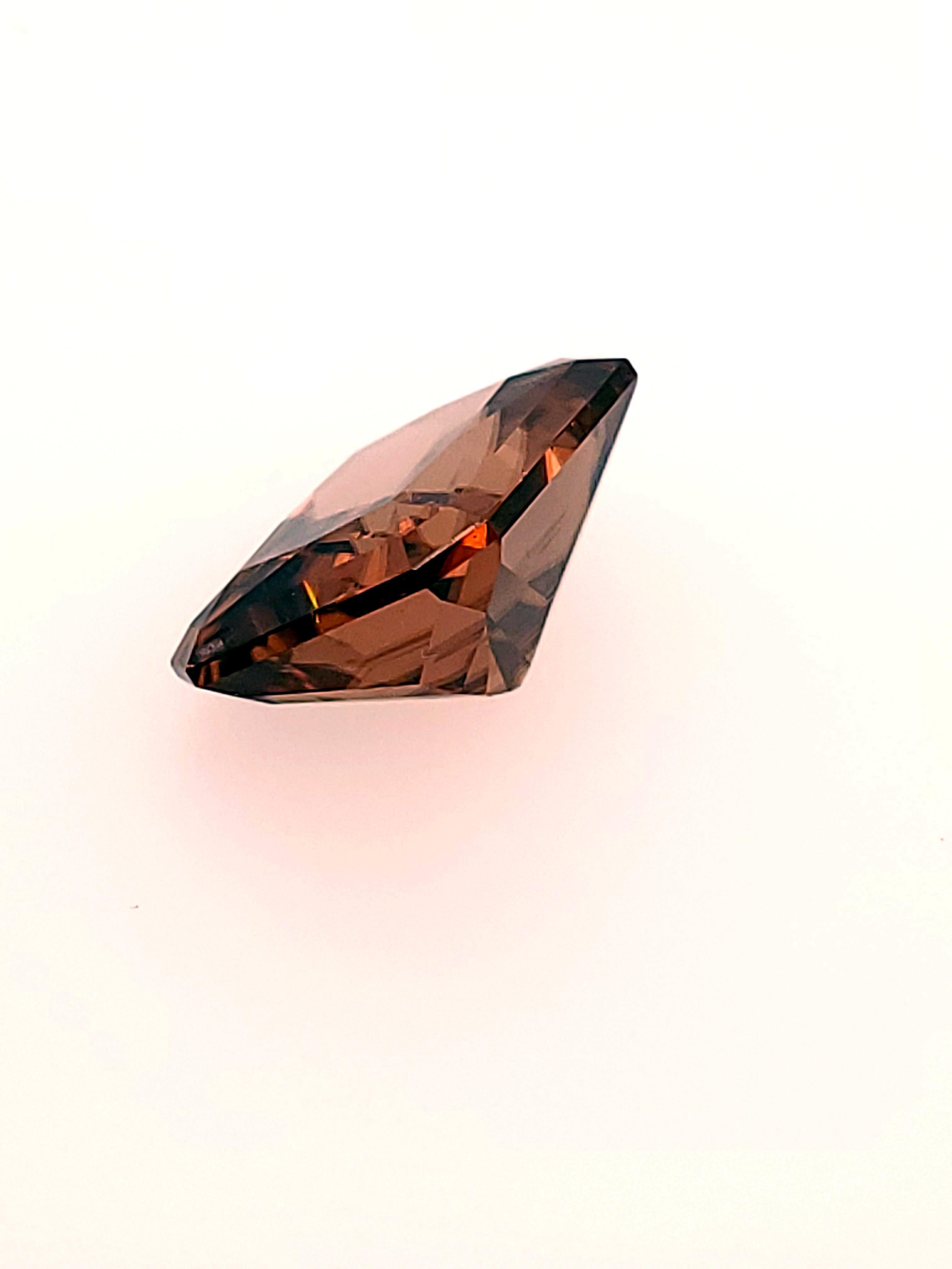 Orangy Zircon, Emerald Cut, weighing 8.71ct and Faceted in the U.S. For Sale 1
