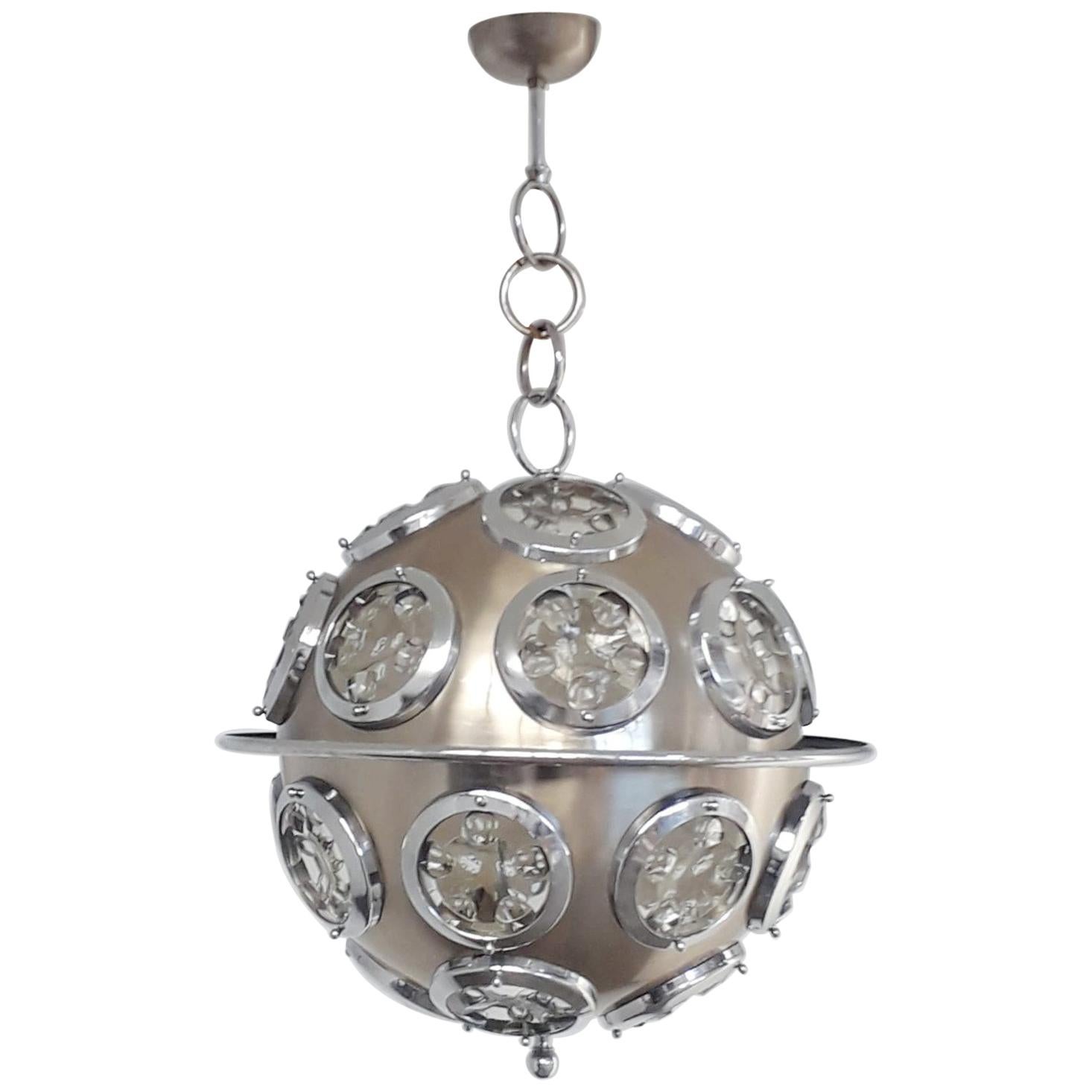 Vintage Italian chandelier with brushed steel circular structure and optical beveled glass lenses / Designed by Oscar Torlasco for Lumi circa 1960s / Made in Italy
6 lights / E12 or E14 type / max 40W each
Diameter: 19.5 inches / Total Height: 31.5