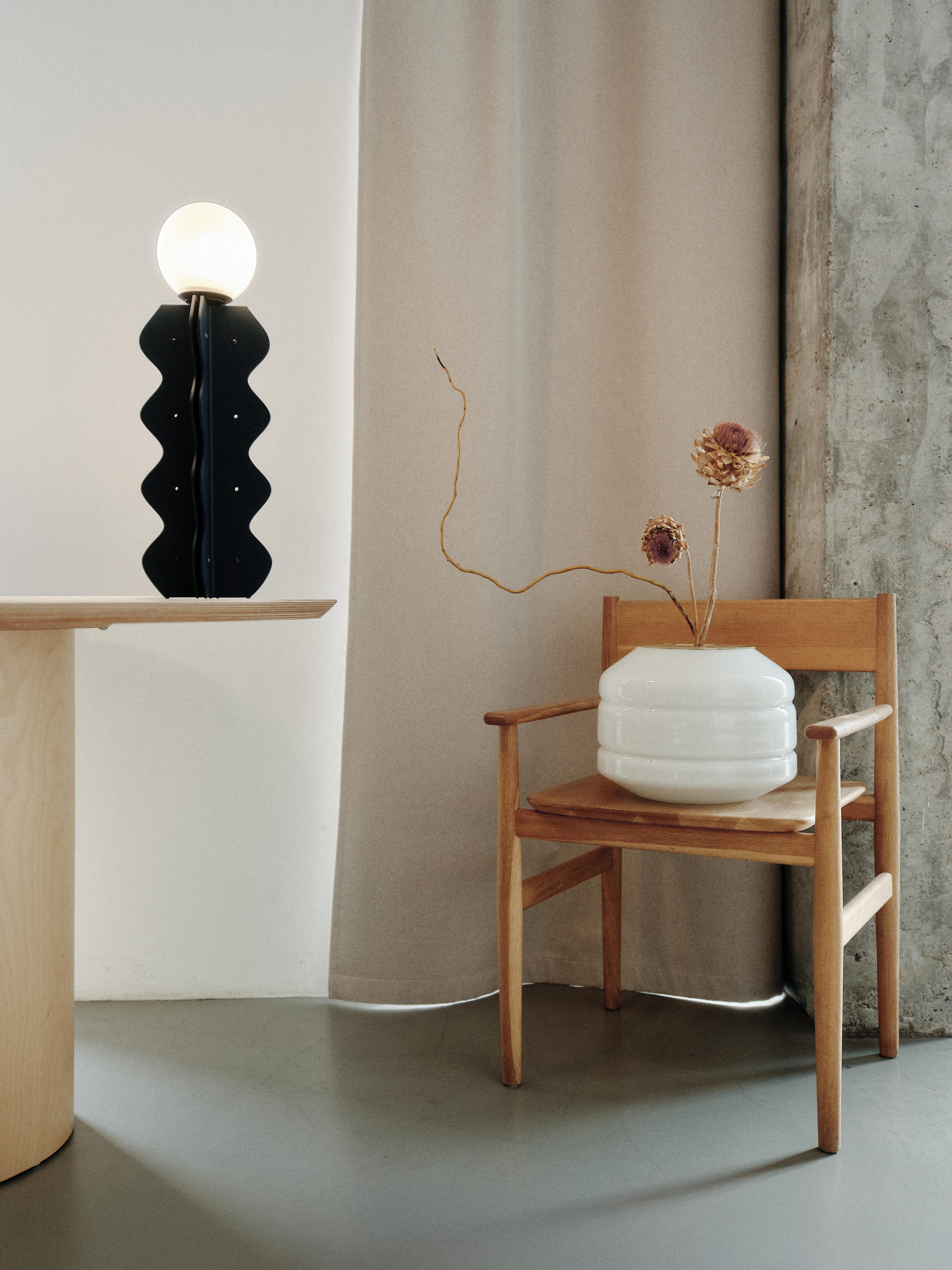 A Fusion of Light and Form: Blown-Glass Vase & 