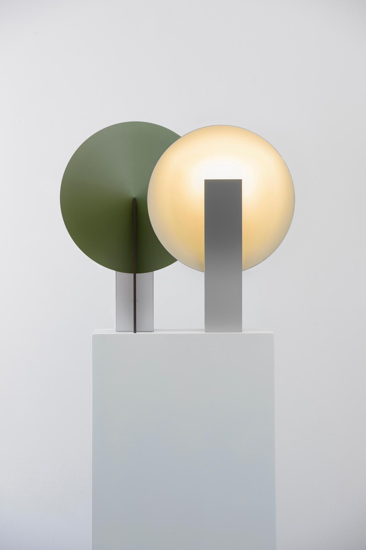 ORBE is a table lamp with indirect light, designed to provide soft illumination to the environment.

The piece has a simple structure, composed by the minimum required for its functionality: the front box houses the light source and provides the