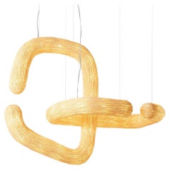 Orbette Medium di Ango - Lampada a sospensione scultorea realizzata a mano in rattan naturale
