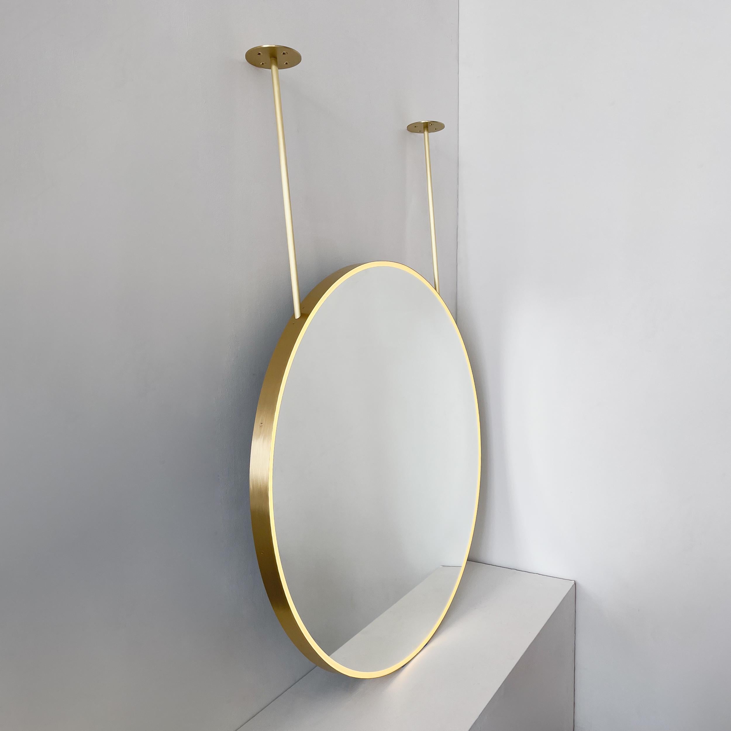 British Orbis Ceiling Suspended Illuminated Round Mirror with Brass Frame and Two Arms For Sale