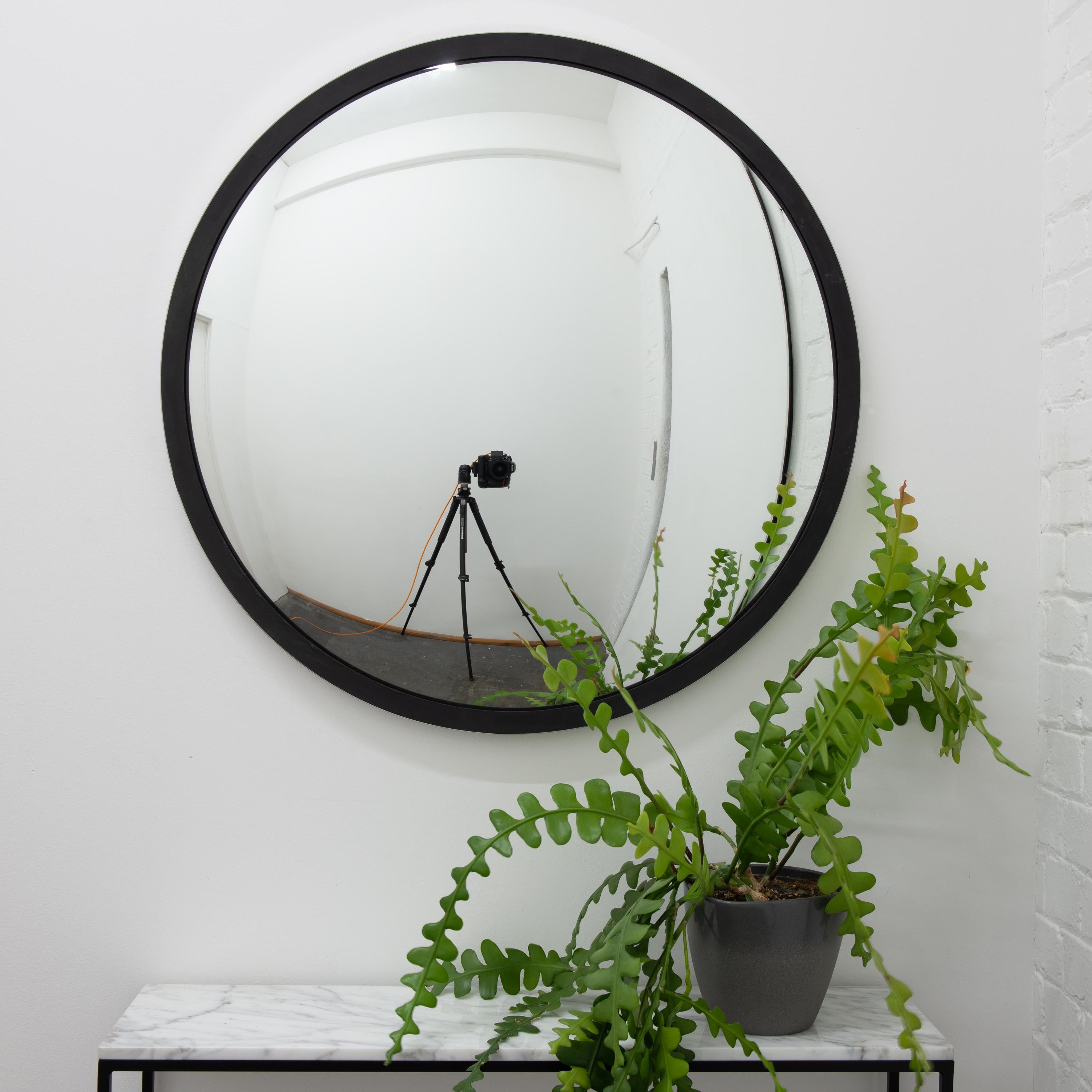 Stunning convex mirror with a polished stainless steel frame.

Each Orbis™ convex mirror is designed and handcrafted in London, UK. Slight variations in sizes and imperfections on edges and surface finishes are characteristics of such original