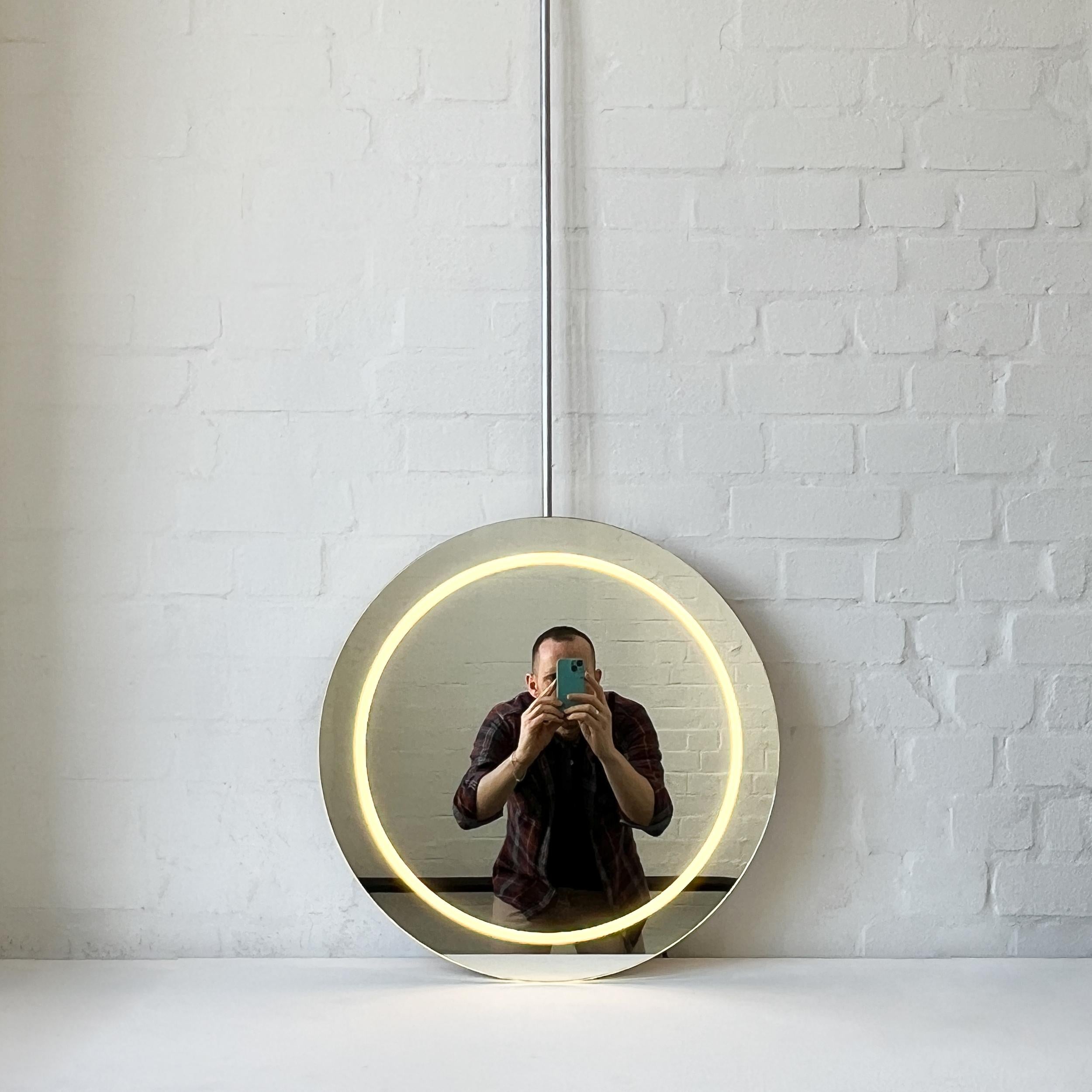 British Orbis Illuminated Ceiling Suspended Round Frameless Mirror For Sale