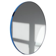 Miroir contemporain rond Orbis avec cadre bleu, régulier