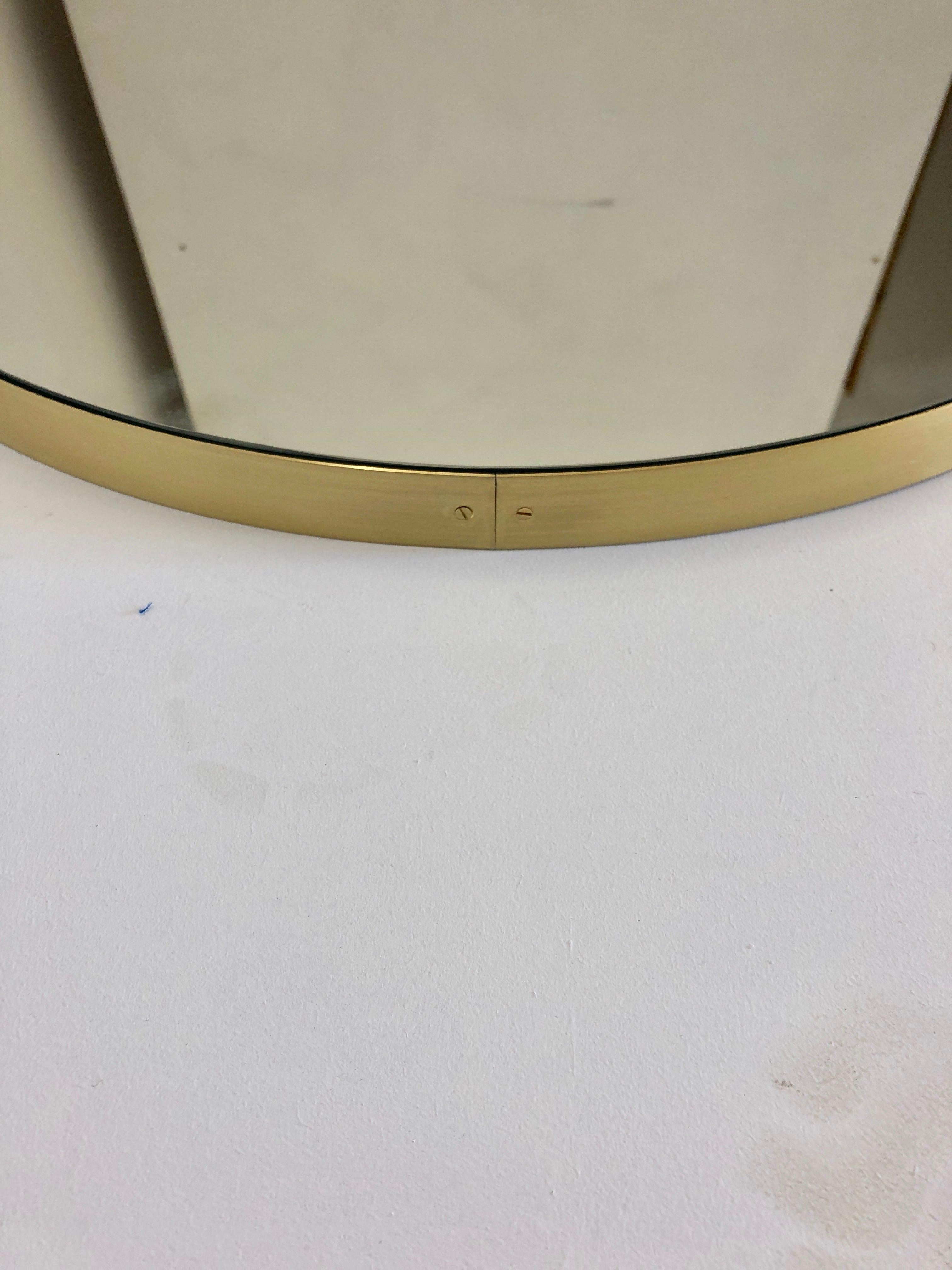 Organic Modern Orbis™ Round Double Sided Suspended Bathroom Mirror with a Brass Frame