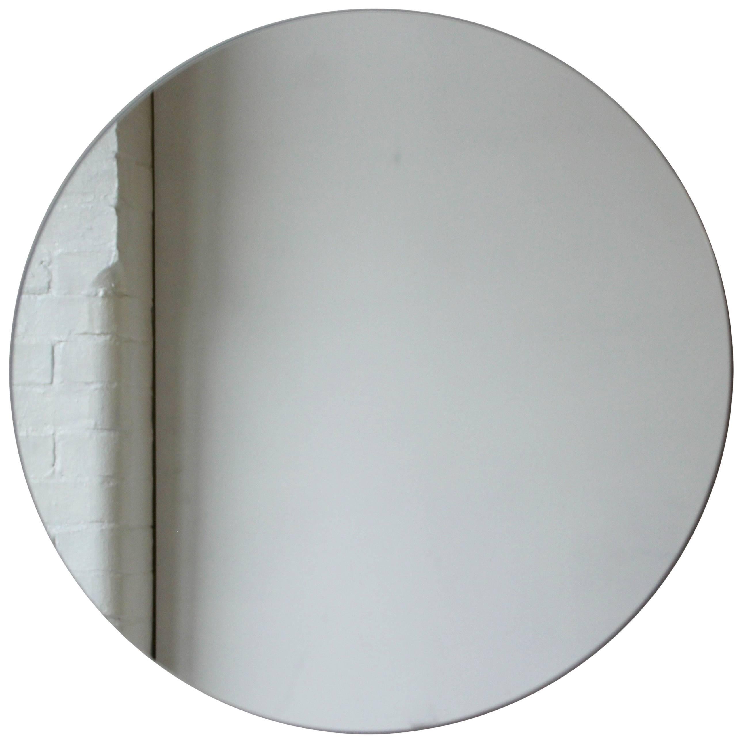 In Stock Orbis Round Minimalist Contemporary Frameless Mirror, Large For Sale