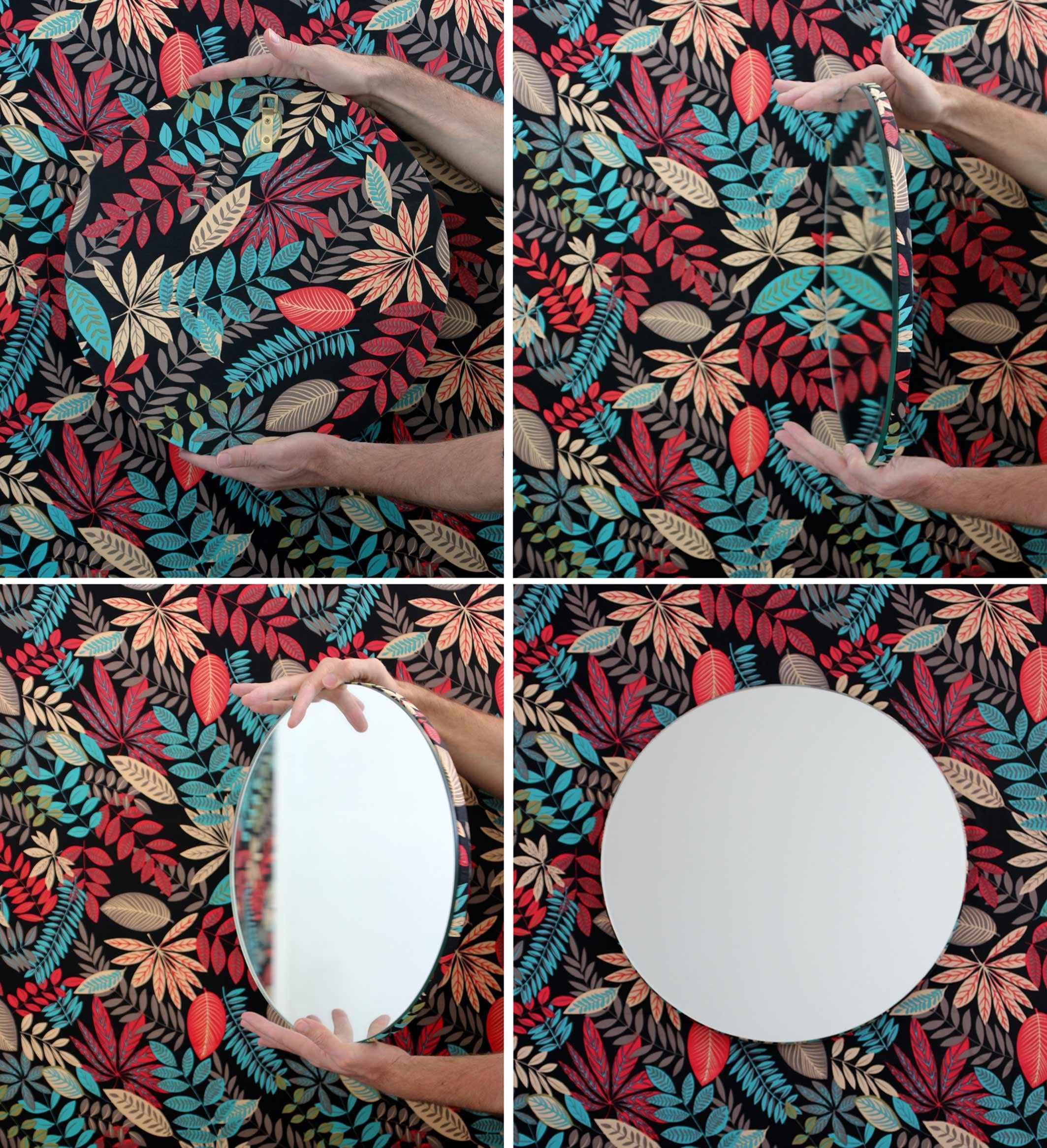 Delightful handcrafted silver round mirror with a modern floral printed fabric backing.

Available in:

Measures: Small: 40cm / 15.8