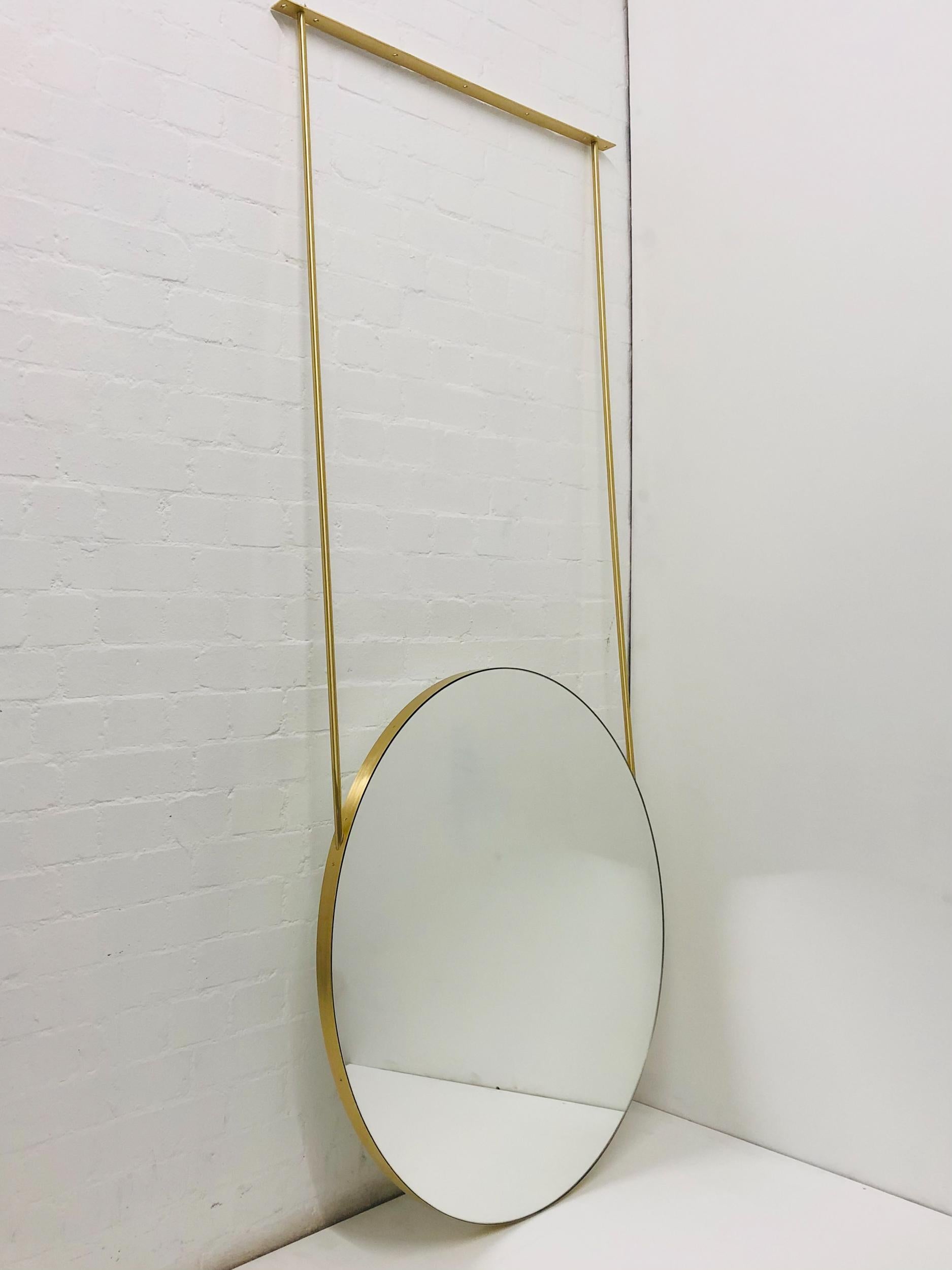 British Orbis Suspended Double Sided Round Mirror with Brushed Brass Frame and Two Arms For Sale