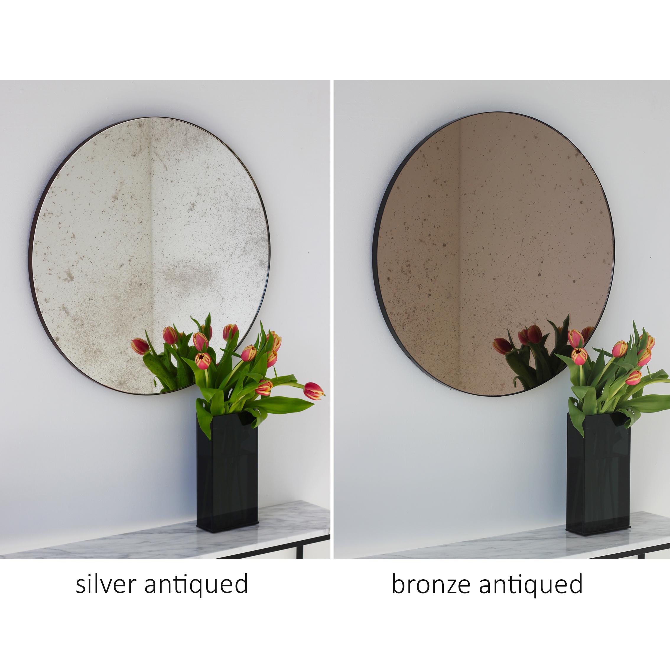 Aluminum Orbis Antiqued Bronze Tinted Modernist Round Mirror with Black Frame, Large For Sale