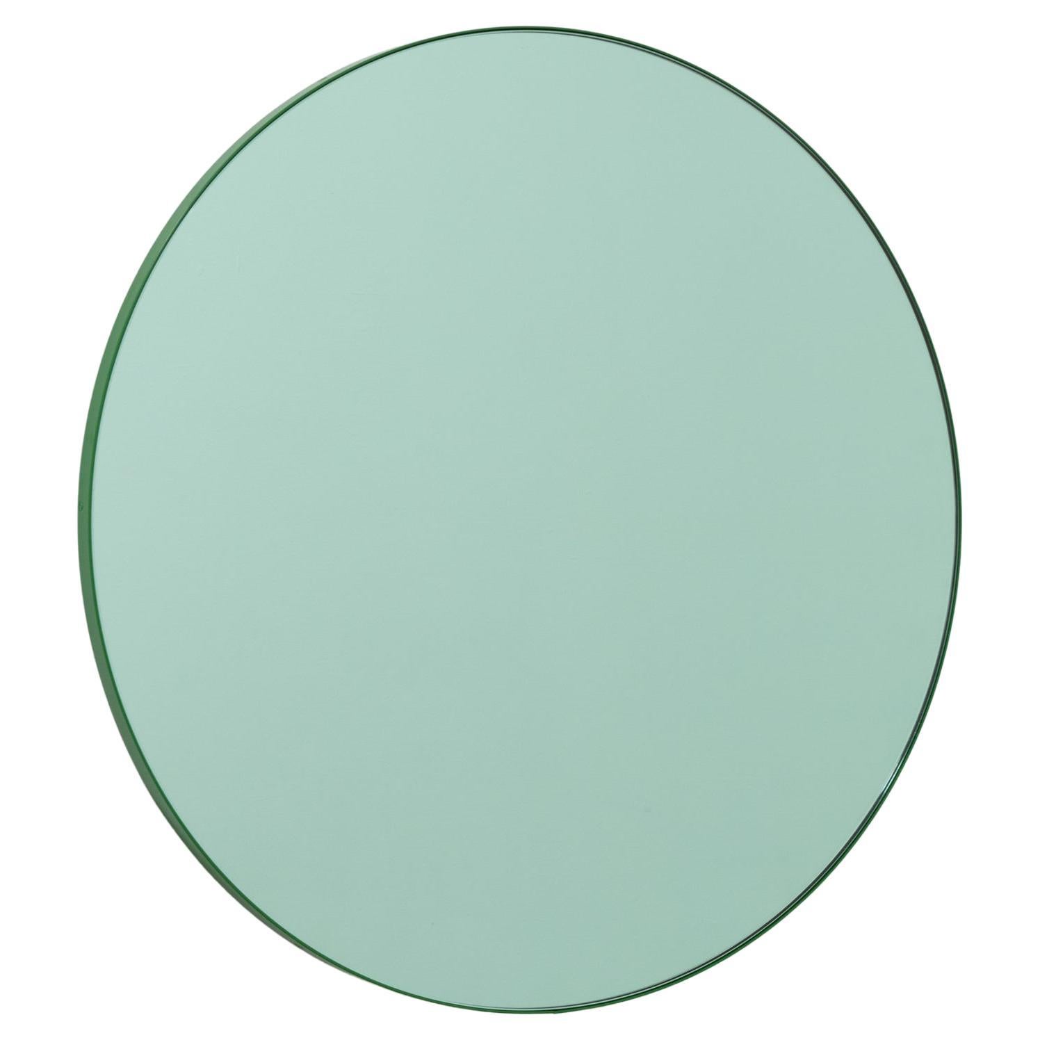 A Shimmering Mirror with Emerald Green Glass Frame at 1stDibs