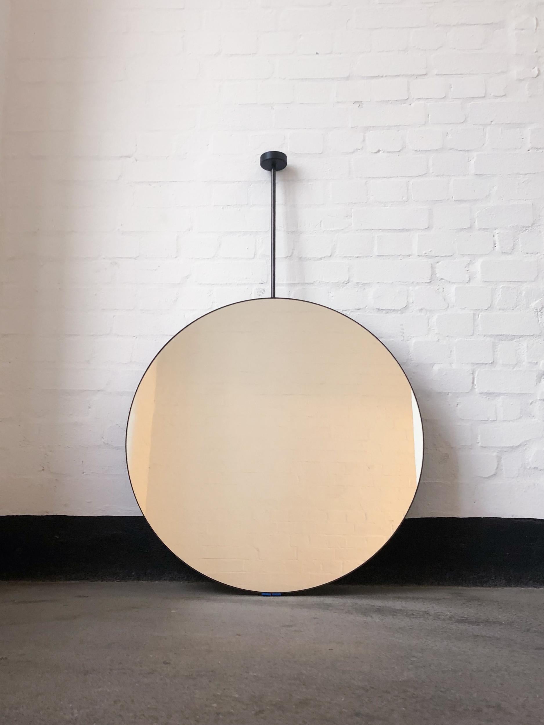 British Orbis Ceiling Suspended Round Mirror with Blackened Stainless Steel Frame For Sale