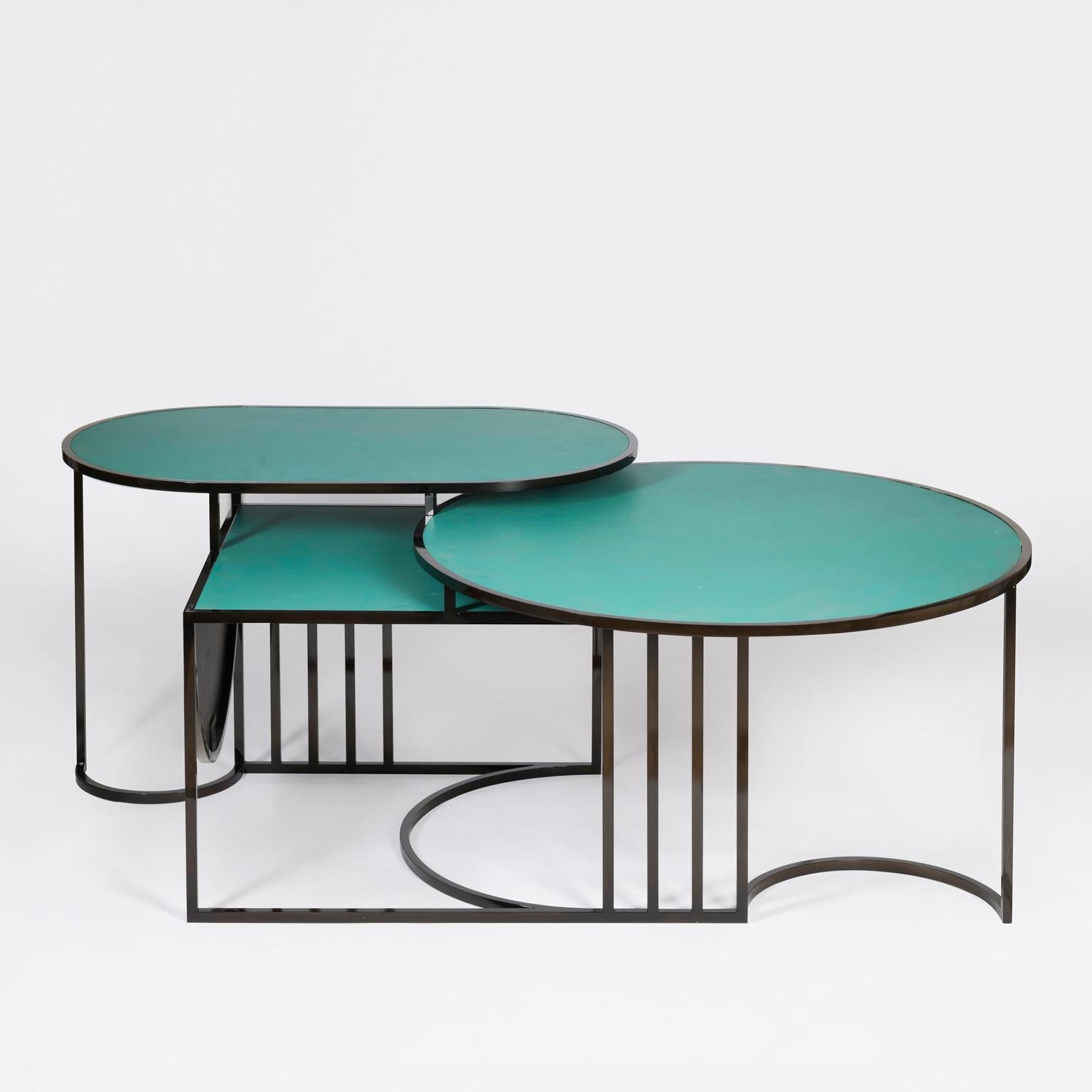 *This table is a sample, it has some scratches and imperfections, please see photos attached.*

The Orbit Coffee table is constructed from three tiered tops: round, oblong and square, each resting at different height level.
 

Lara Bohinc’s new