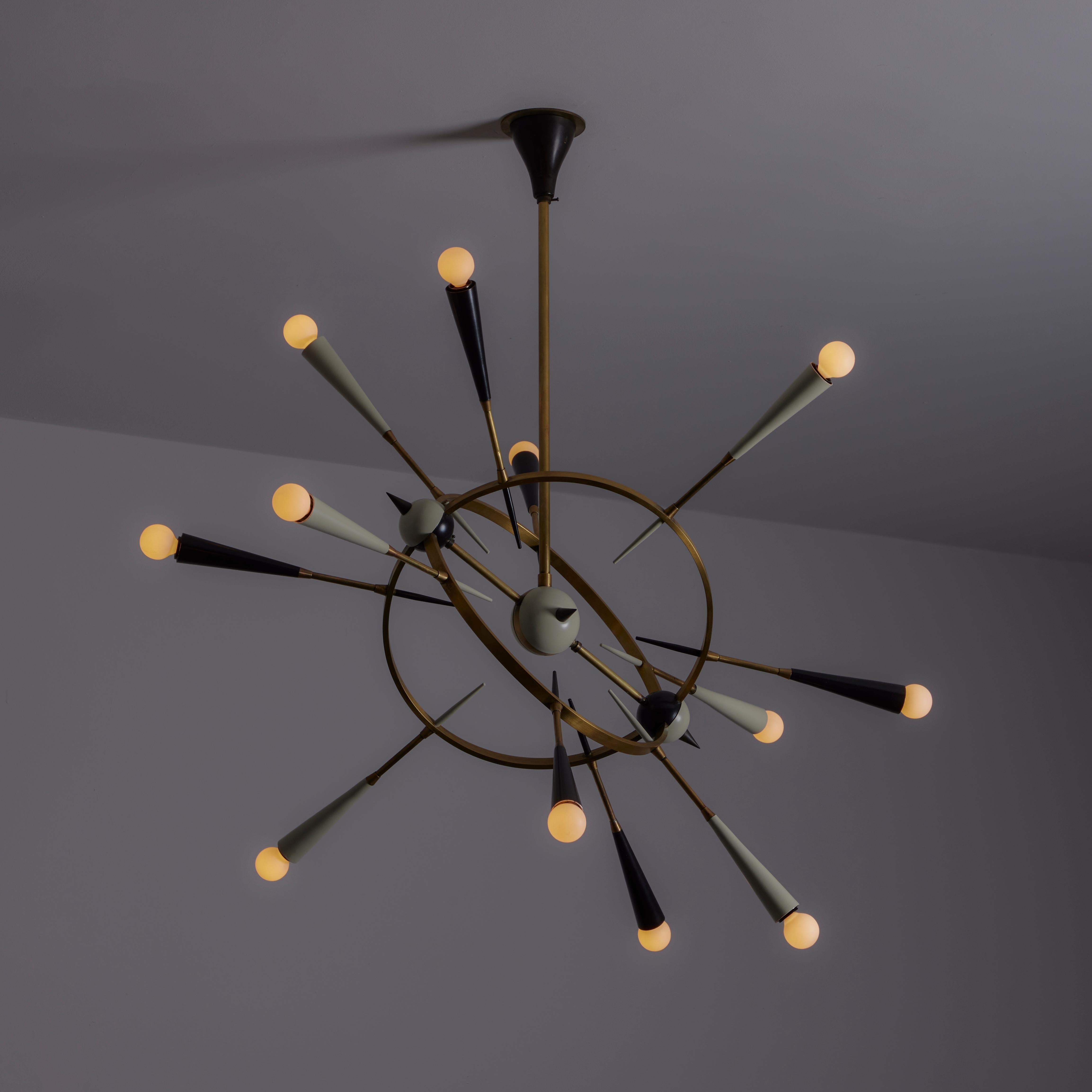 Orbital Ceiling Light by Stilnovo Designed and manufactured in Italy, circa the 1950s. A planetary chandelier consisting of two rings on an axis point. The axis point can be rotated to around 15-20 degrees to achieve a few different orientations.