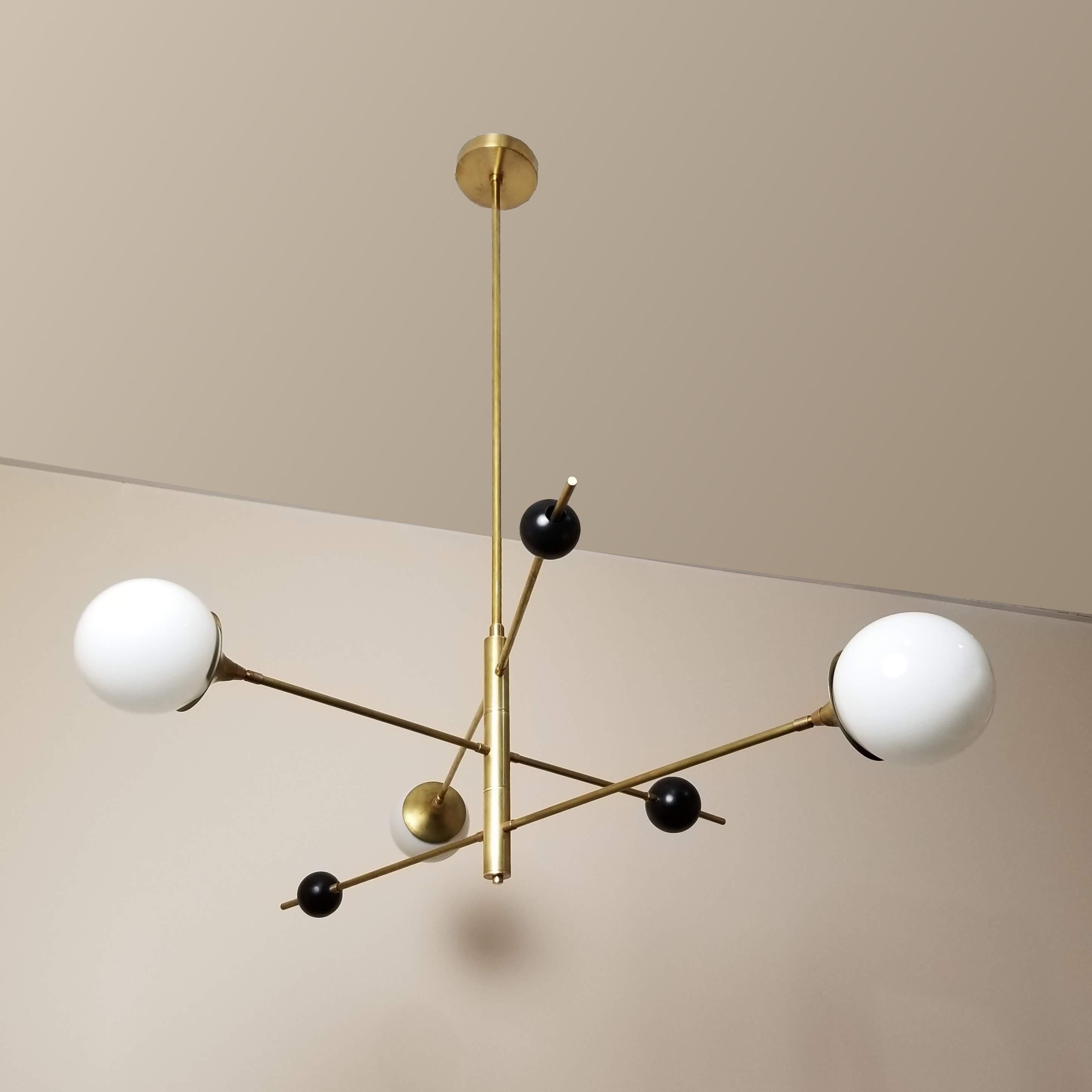 Handcrafted in NYC by Blueprint Lighting, our 'Orbital' three-arm pendant is a more compact version of our wildly popular 'Orbital' six-arm chandelier. It's a commanding statement piece with design elements of both Italian and French modernism and