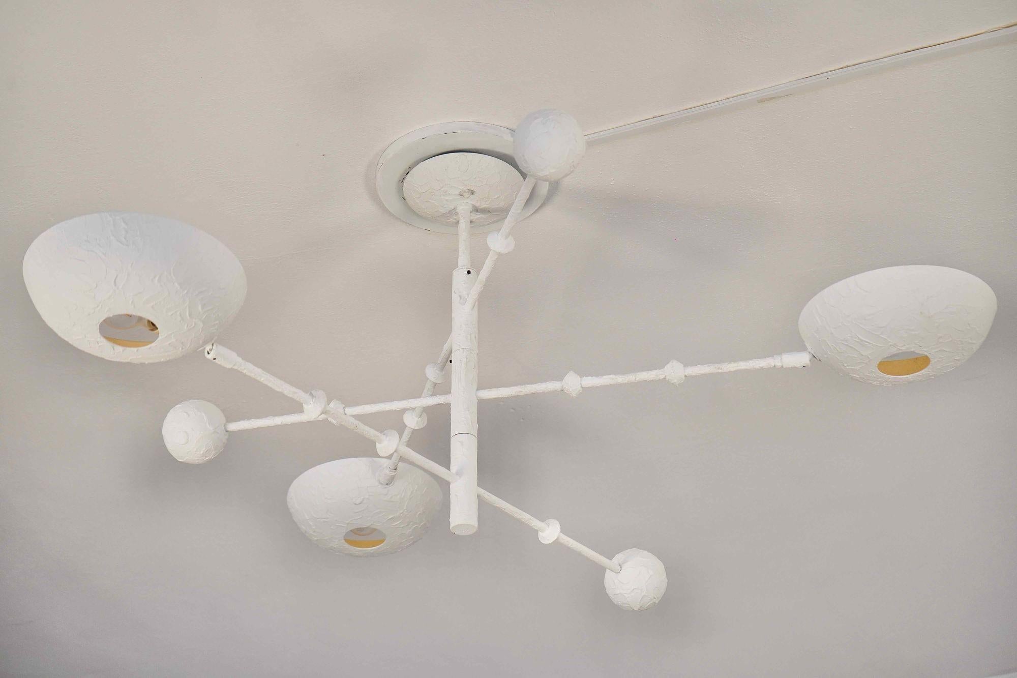 Contemporary Orbitale chandelier with 3 rotating arms on the new Giacometti style finish. For Sale