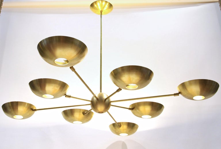 Large sculptural full solid brass Chandelier with 8 arms.
 
I gave the Planetario name for the 8 planets and the sun representation. it's just one of the best chandelier I've designed.

The chandelier is made in full brass, including the shades. Has
